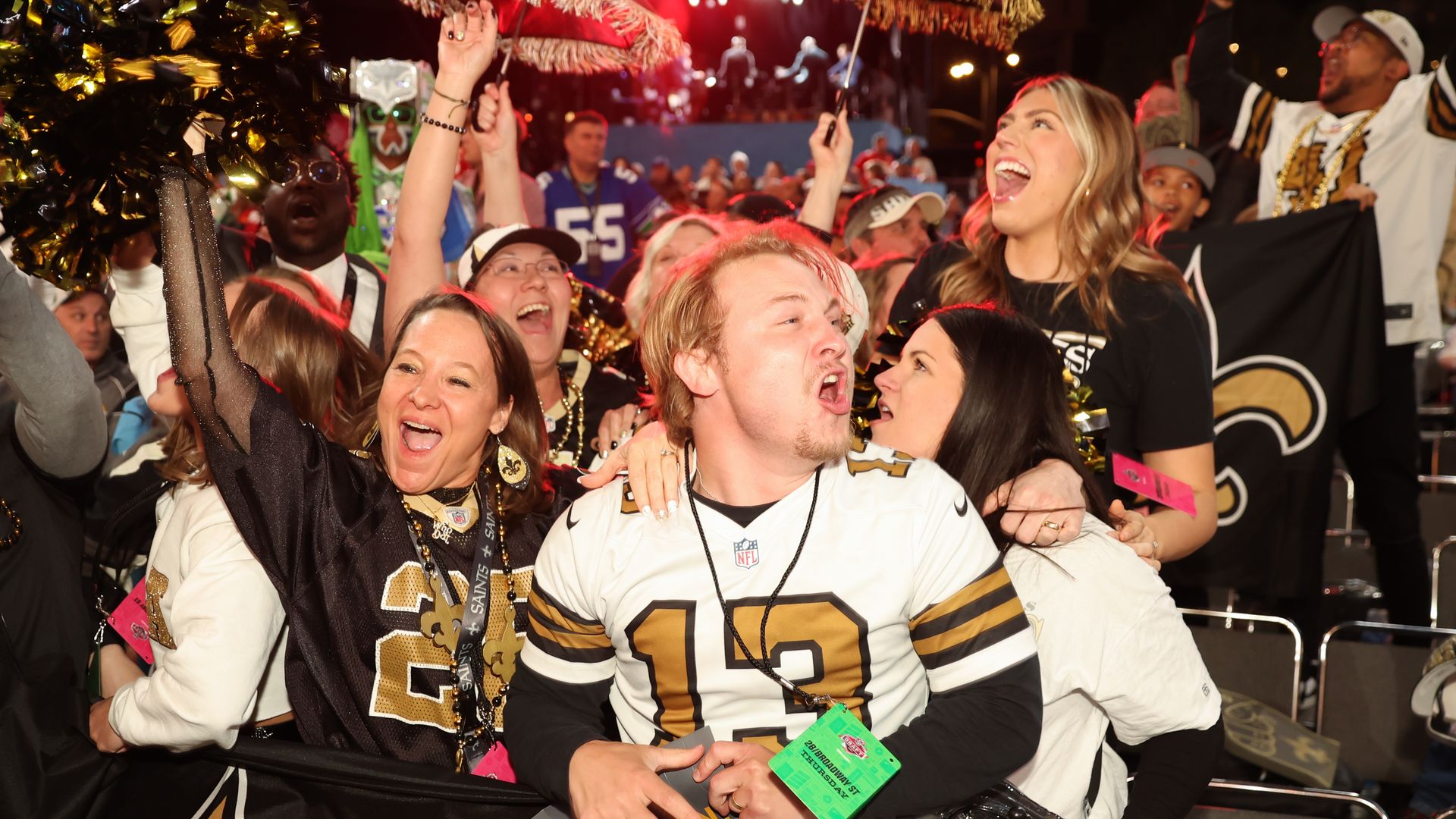 Photo shows Saints fan yelling happily during the first round of the NFL Draft.