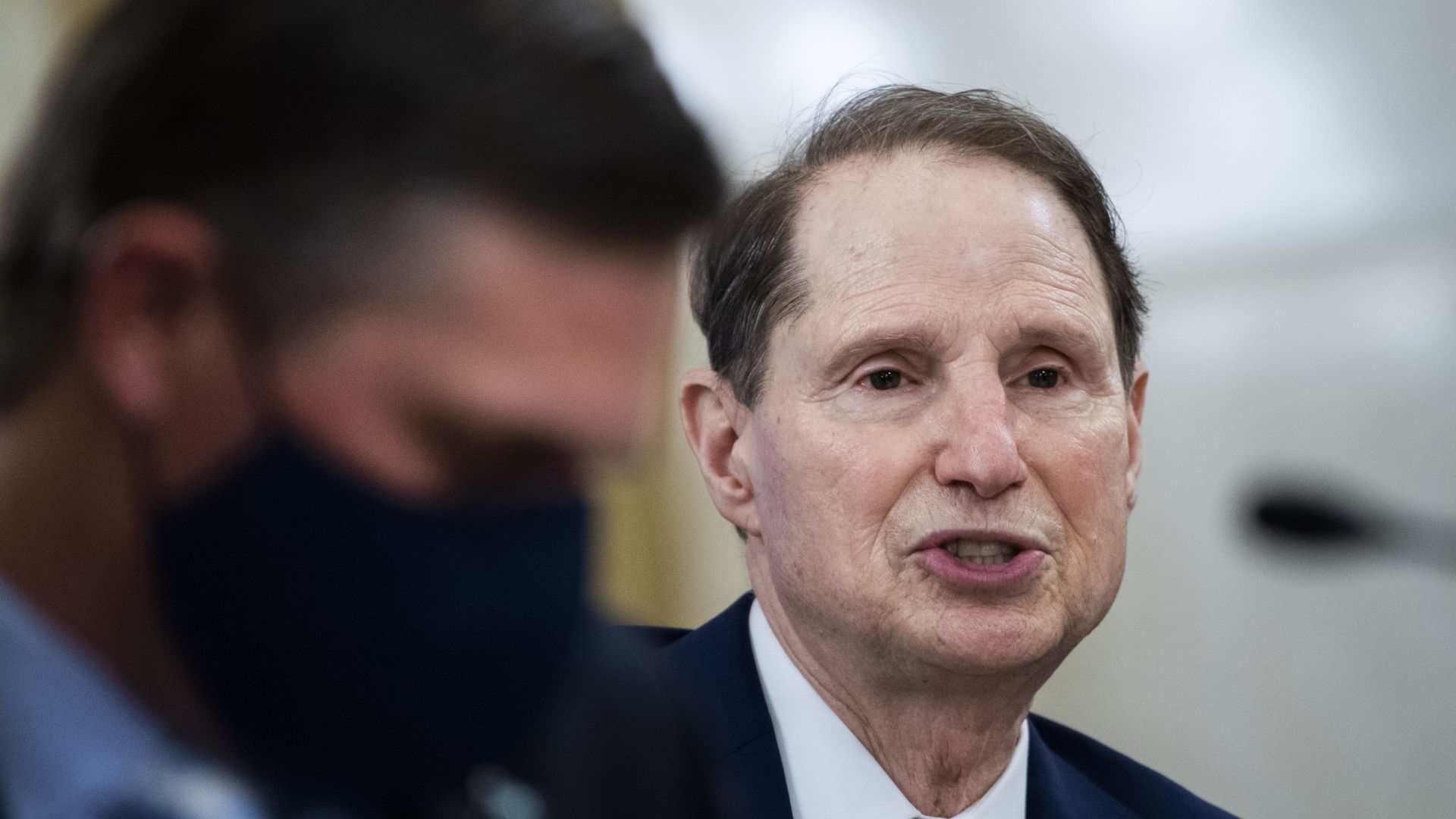 Sens. Martin Heinrich and Ron Wydenduring a Senate Select Intelligence Committee  hearing on Capitol Hill in February 2021. 