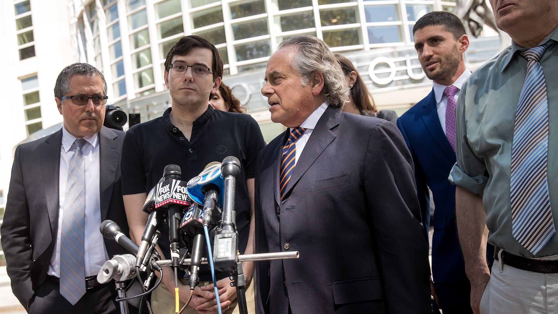 Martin Shkreli with his Lawyer and others.  
