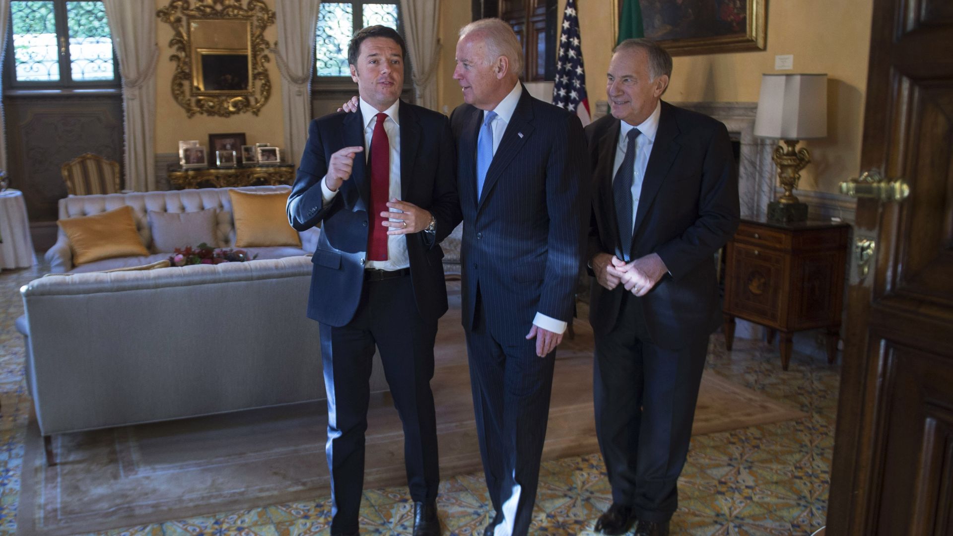 Then-Vice President Joe Biden is seen walking with Italian Prime Minister Matteo Renzi and U.S. Ambassador to Italy John Phillips.