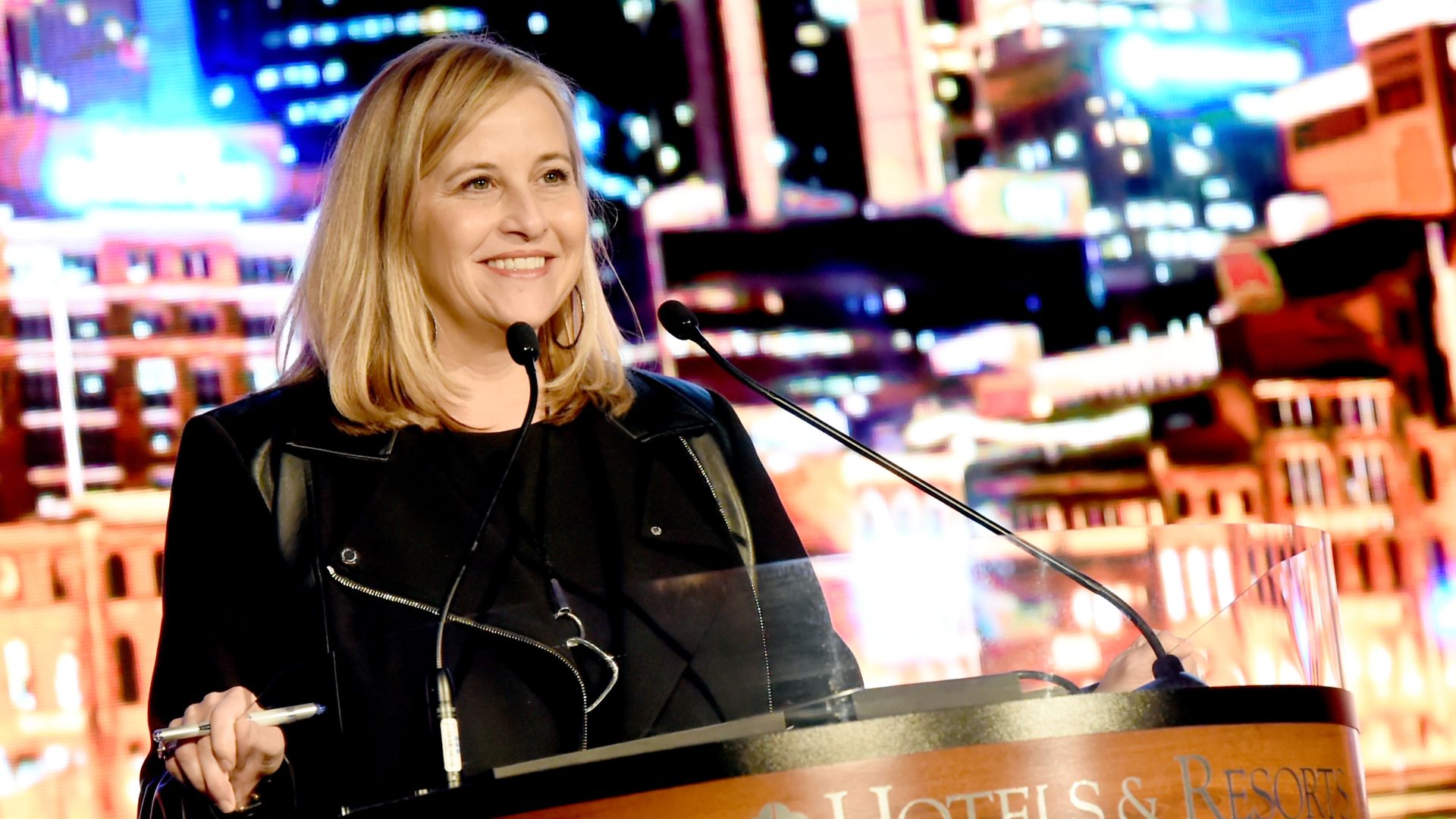 Megan Barry standing at a podium.