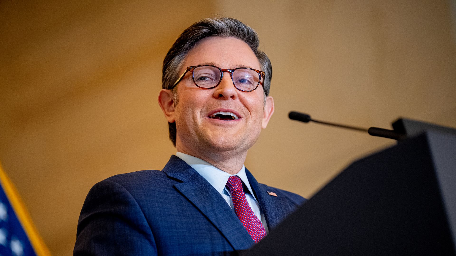 House Speaker Mike Johnson is pictured smiling