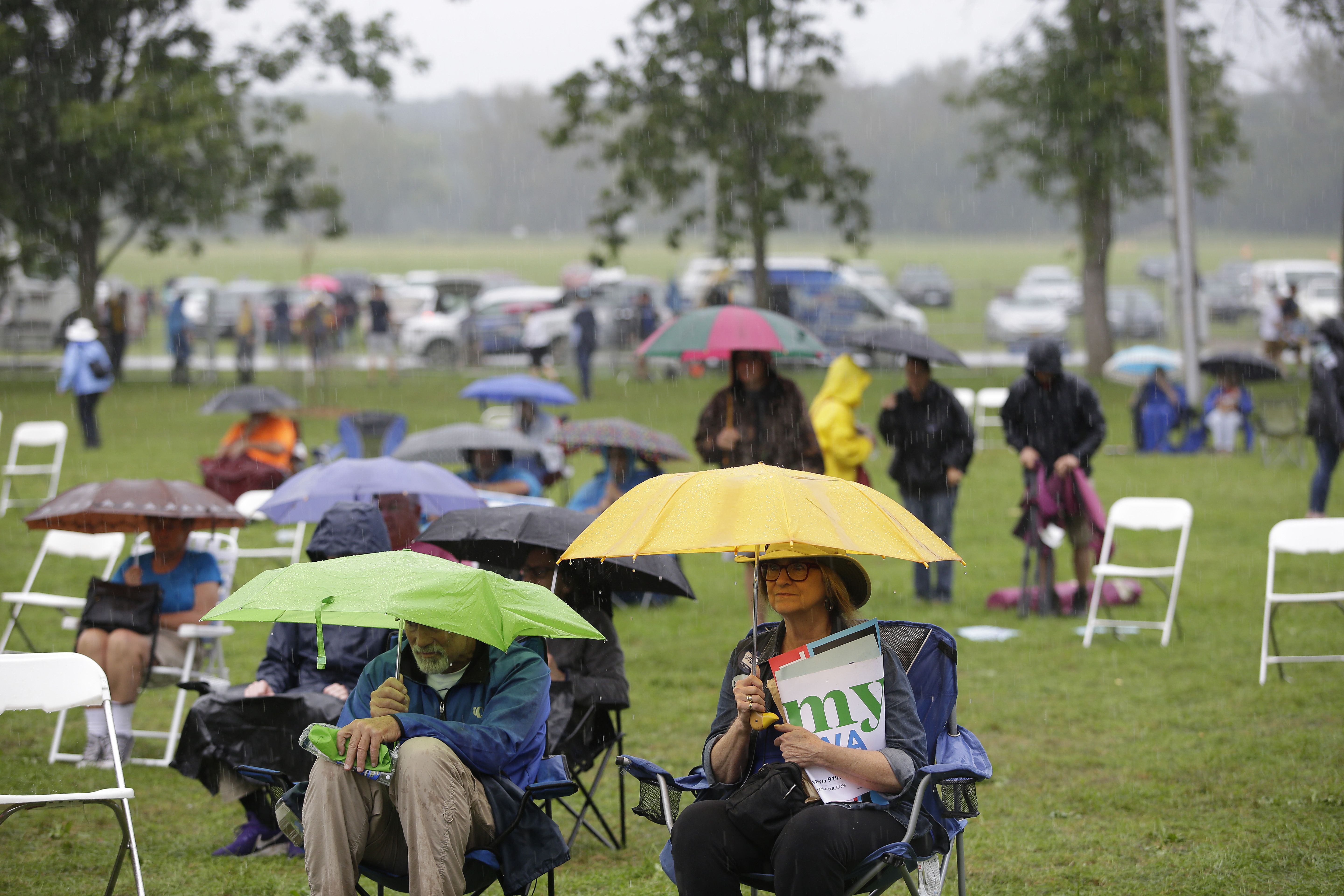 Attendees listen to Democratic presidential candidate, Rep. Tim Ryan (D-OH) speak during the Democratic Polk County Steak Fry on September 21, 2019 in Des Moines, Iowa