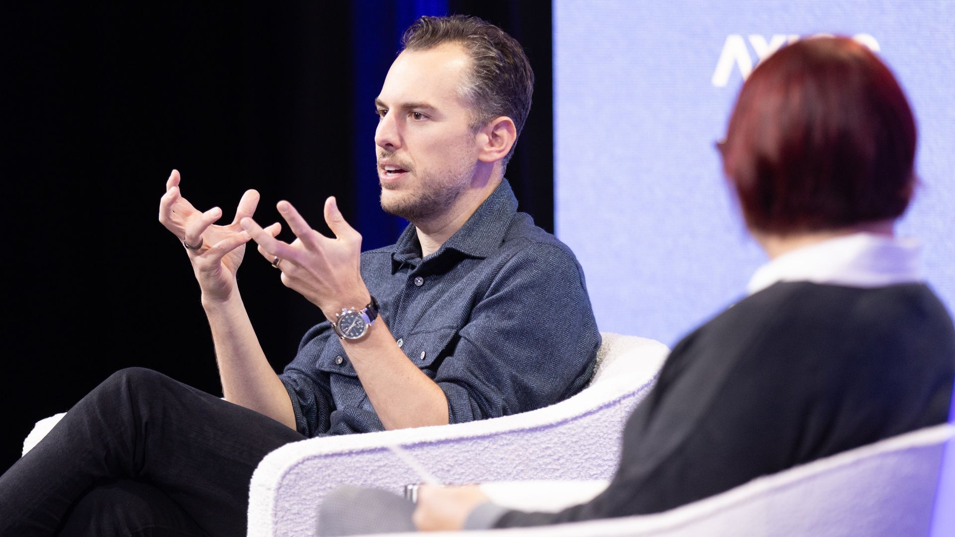 Photo of Mike Krieger on stage at Axios' AI+ Summit