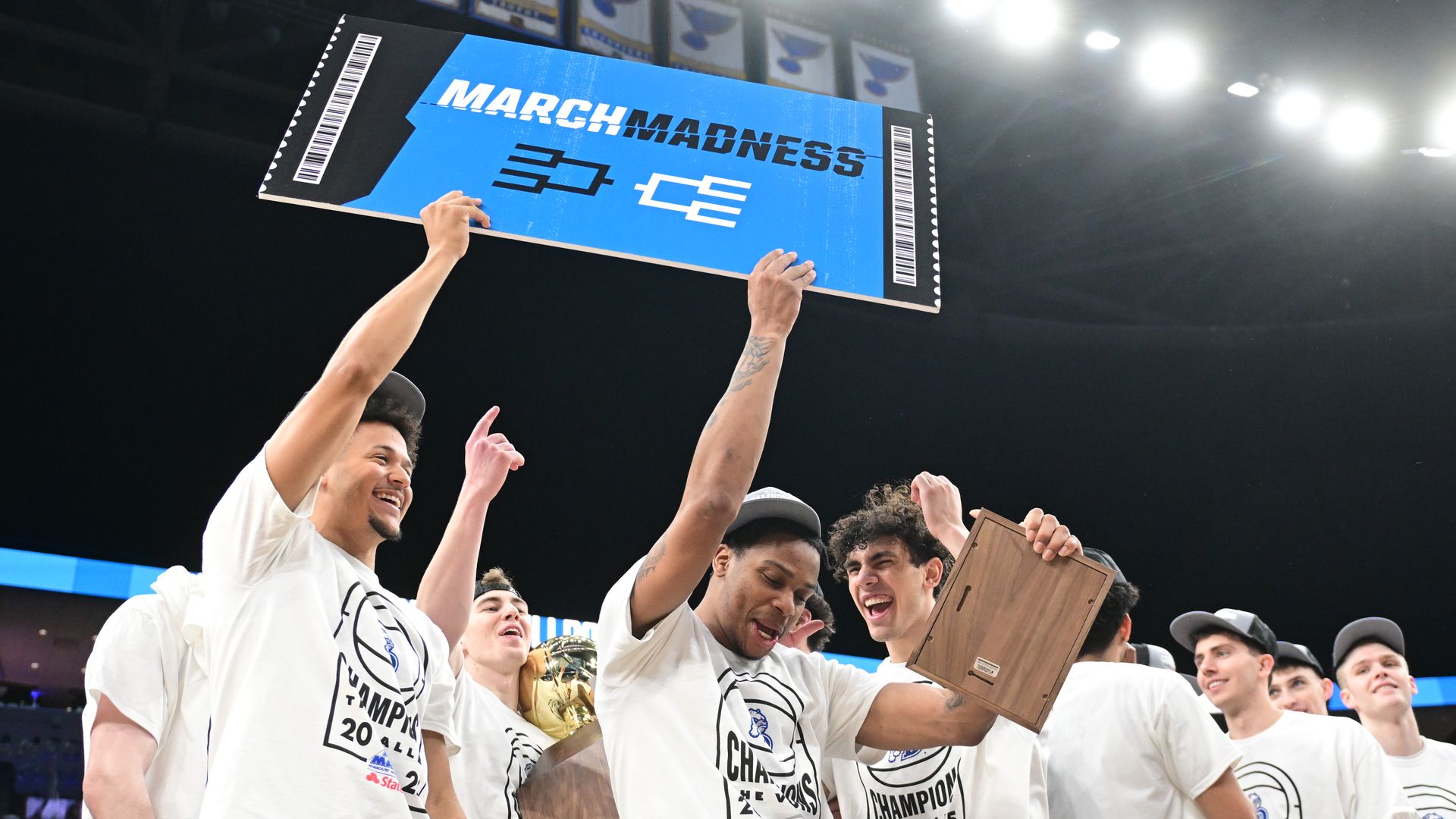 Drake players celebrate after winning the Missouri Valley Conference Basketball Tournament between the Bradley Braves and the Drake Bulldogs on March 09, 2025, at Enterprise Center, St. Louis MO.