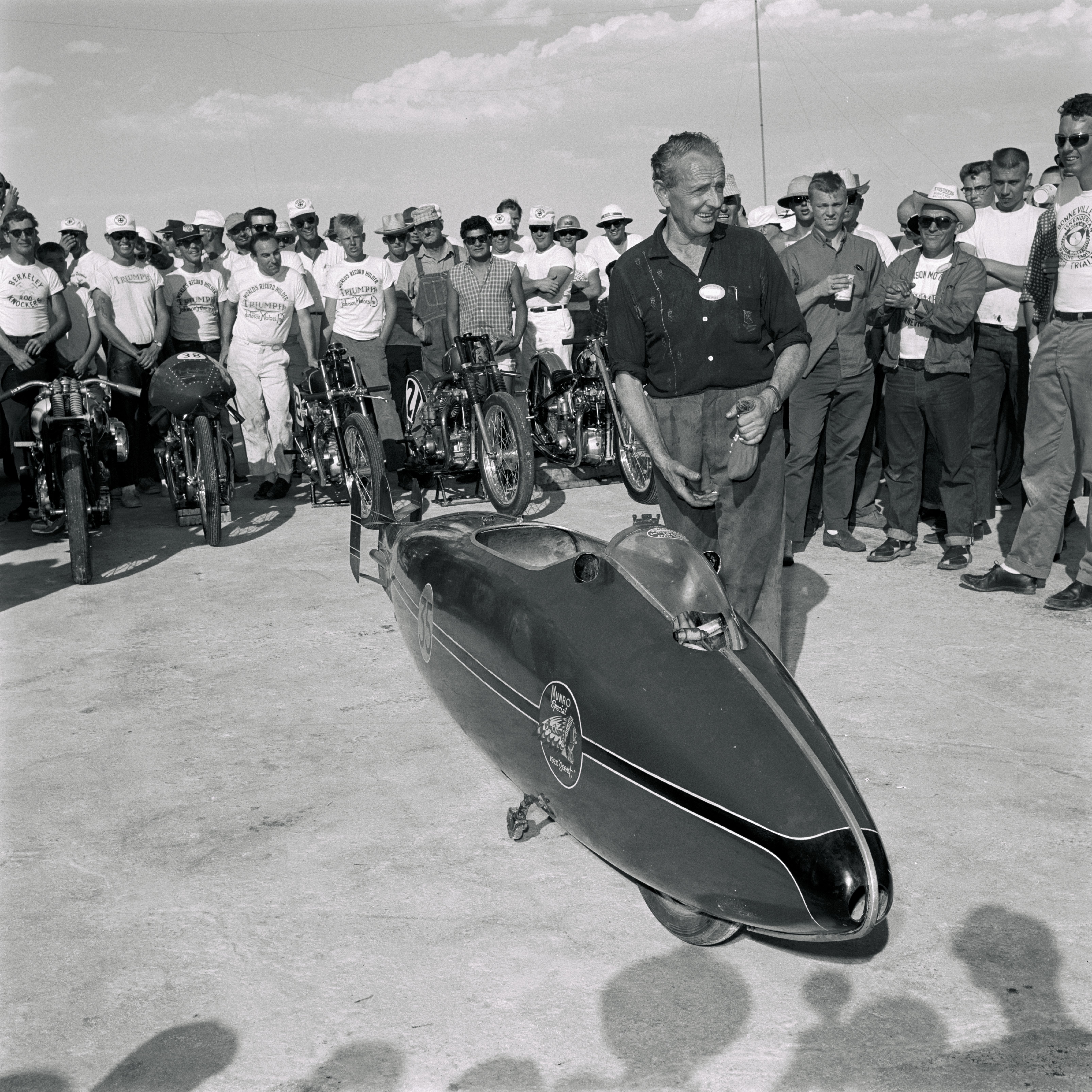 Motorcyclist Burt Munro with the "Munro Special" — AKA the "World's Fastest Indian" — on the salt flats following Munro's first record.