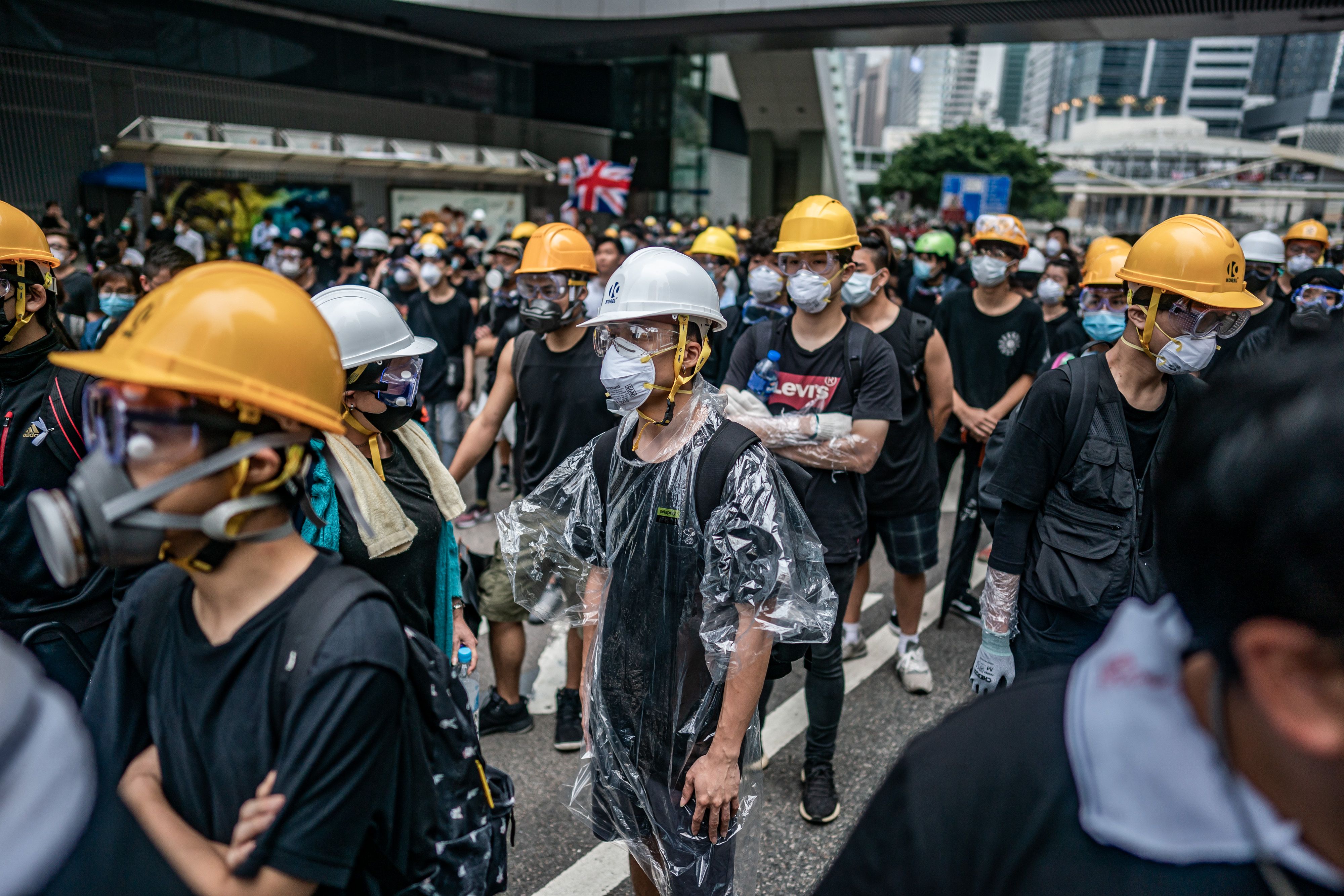 Protesters stand off with police as police officers attempt to clear the road after a demonstration against the now-suspended extradition bill on June 17, 2019 in Hong Kong China.