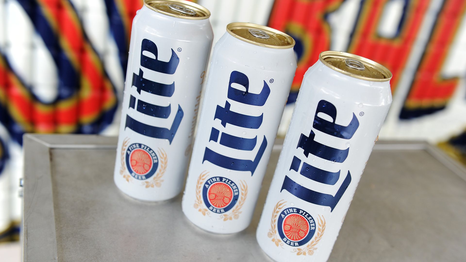 Three Miller Lite cans.