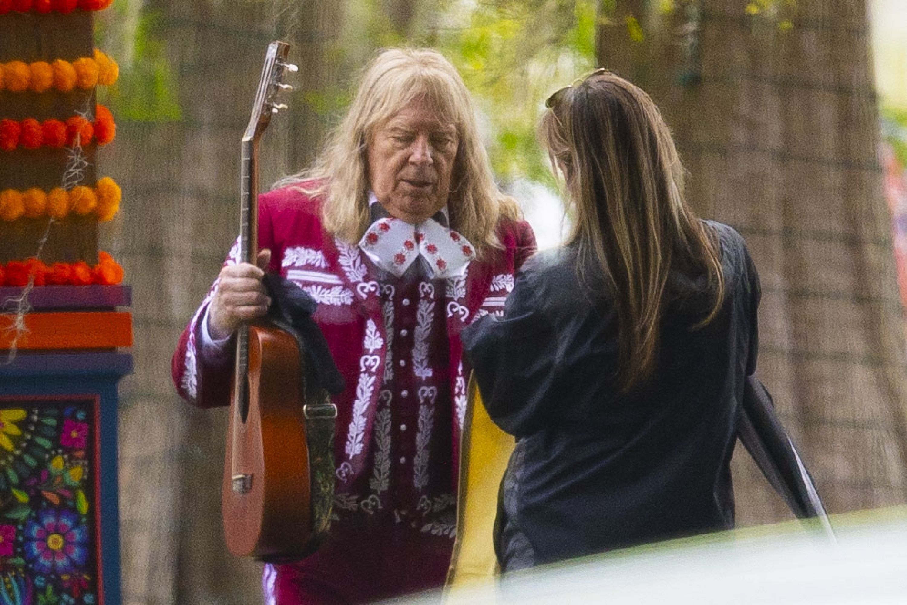 Photo shows Michael McKean getting ready on set.