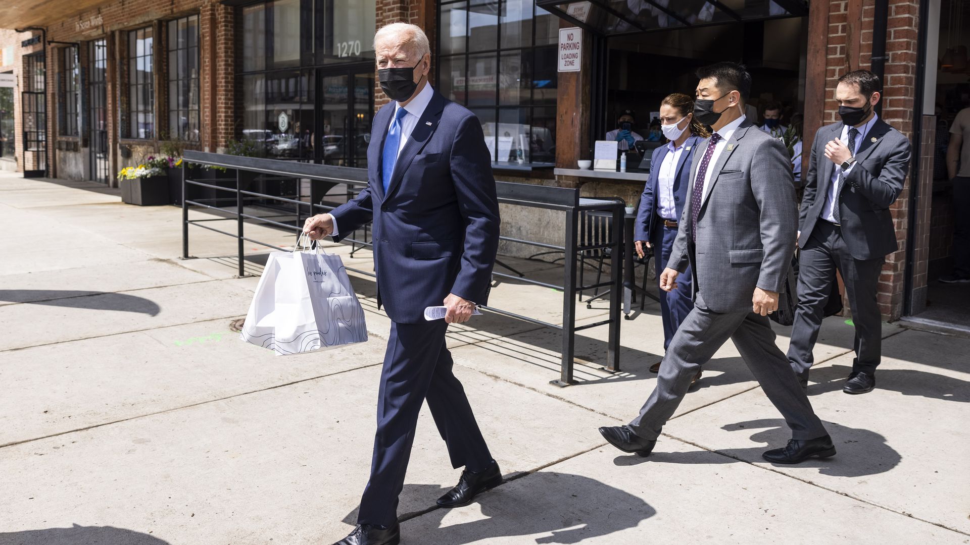 President Biden is seen leaving a Mexican restaurant after picking up some takeout food on Cinco de Mayo.