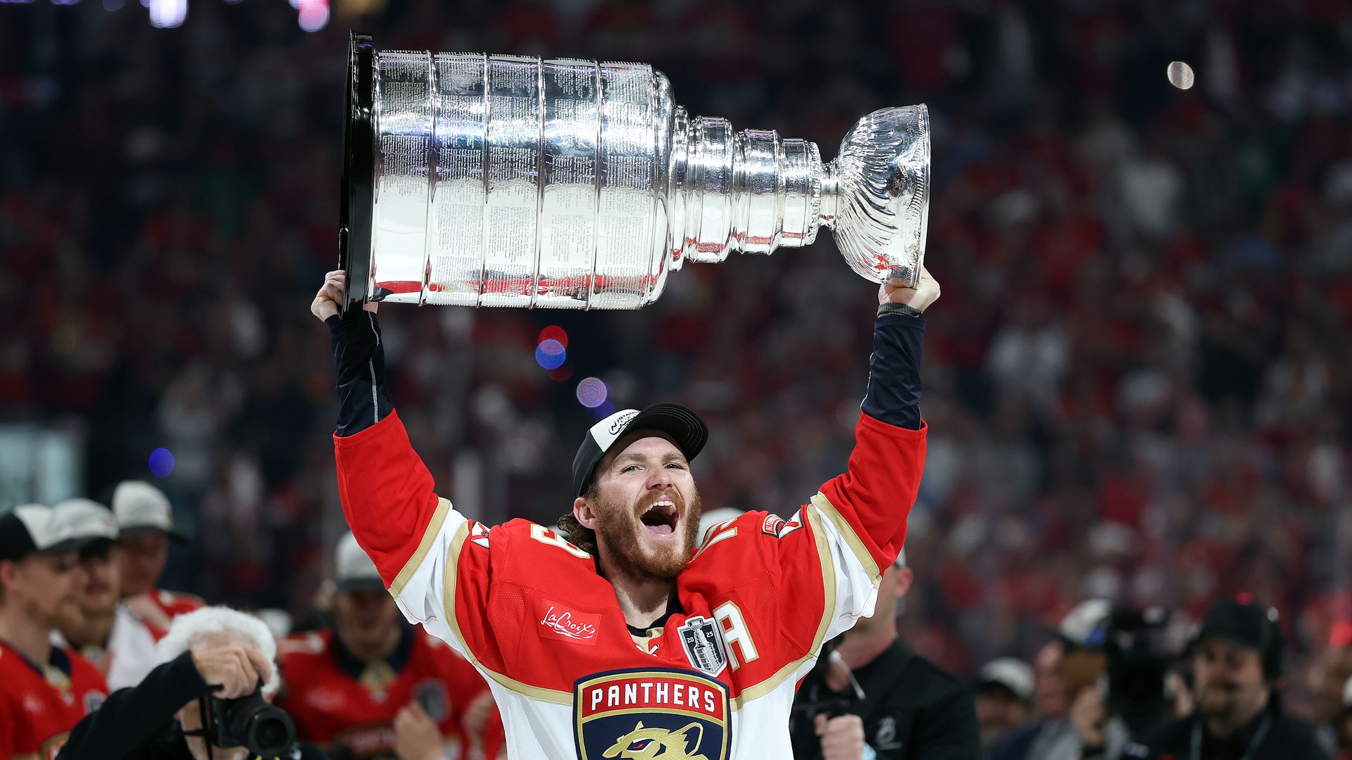 SUNRISE, FLORIDA - JUNE 17: Matthew Tkachuk #19 of the Florida Panthers celebrates with the Stanley Cup after defeating the Edmonton Oilers in Game Six of the 2025 Stanley Cup Final at Amerant Bank Arena on June 17, 2025 in Sunrise, Florida. (Photo by Christian Petersen/Getty Images)