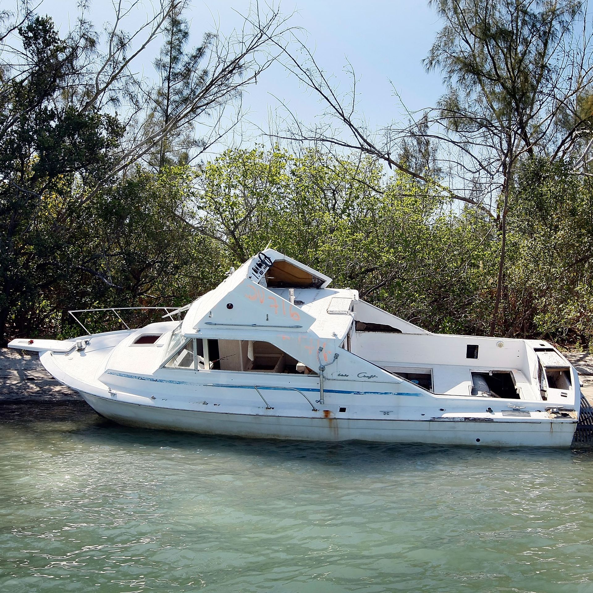 A derelict boat washed up on shore in Miami. 