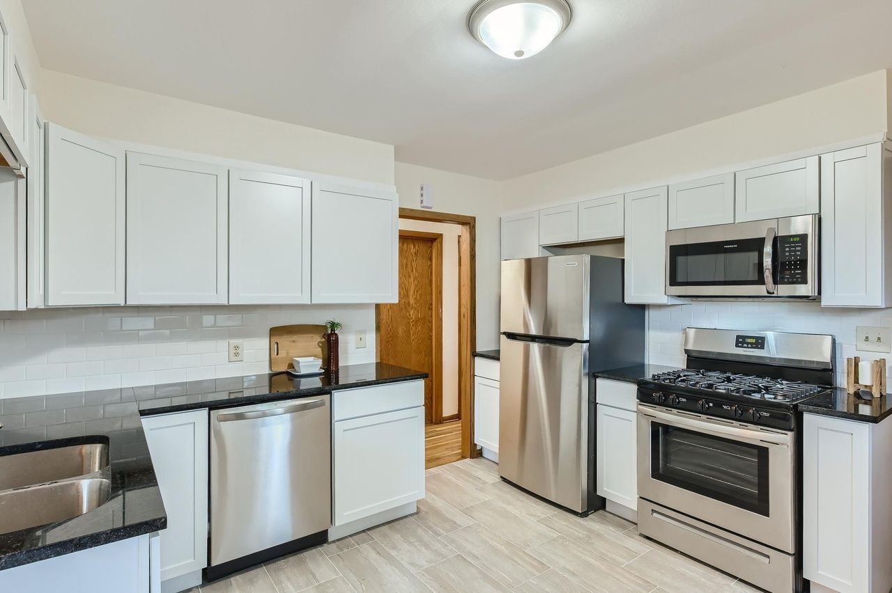 kitchen with white cabinets and stainless appliances