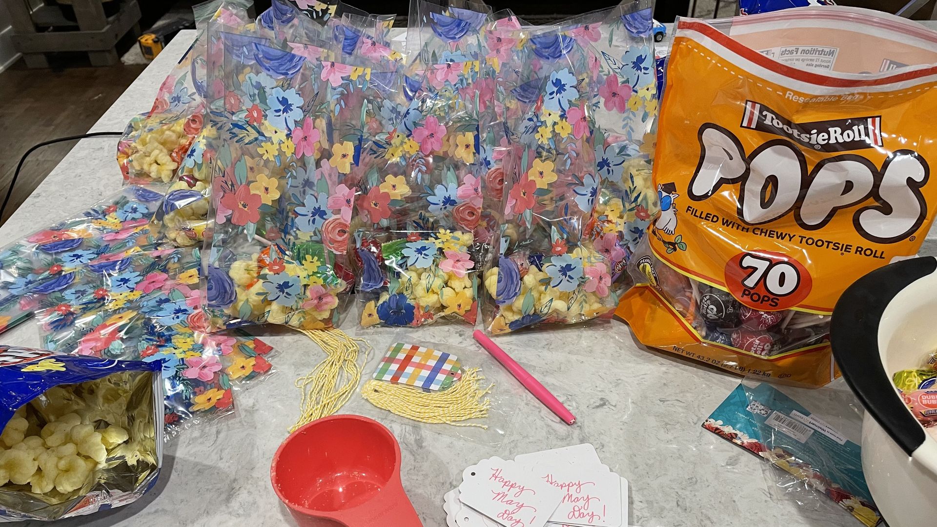 May Day baskets and tootsie pops and snacks in little bags