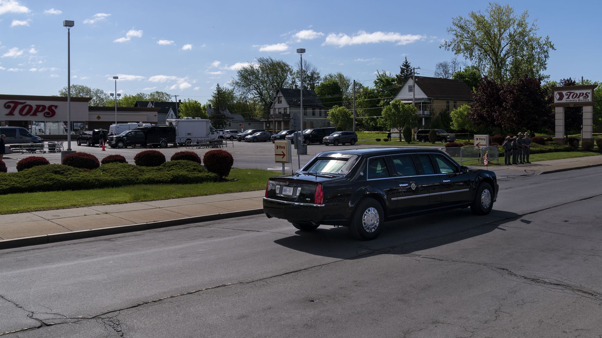 The presidential limousine is seen passing the Tops supermarket in Buffalo.