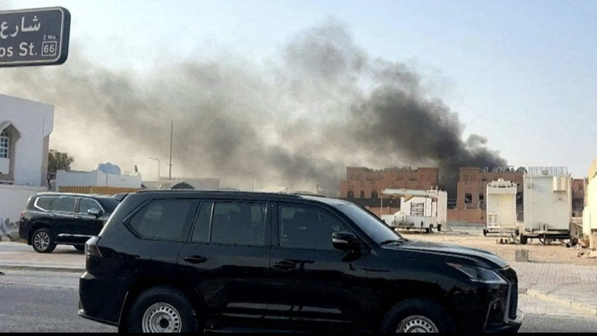 photo of car with smoke behind