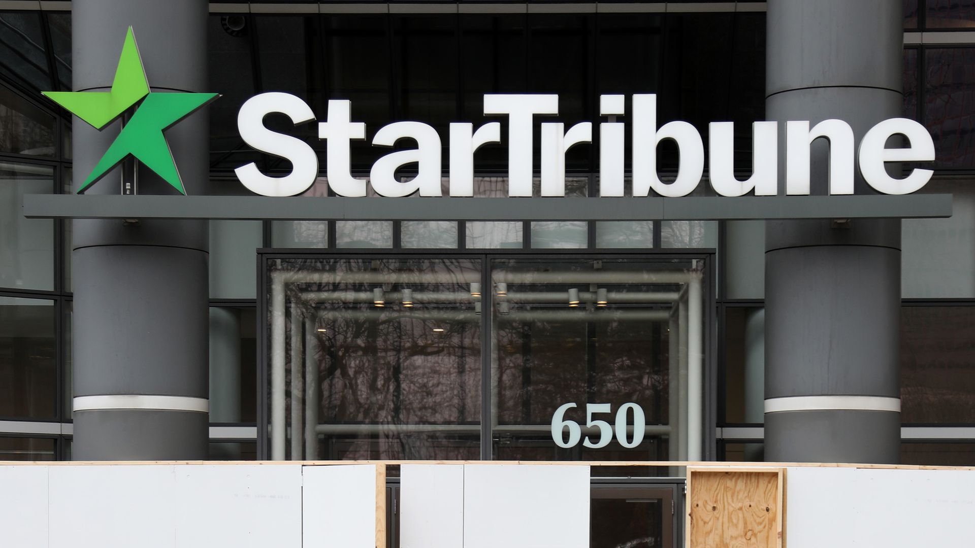 The logo of the Star Tribune newspaper on the front of an office building