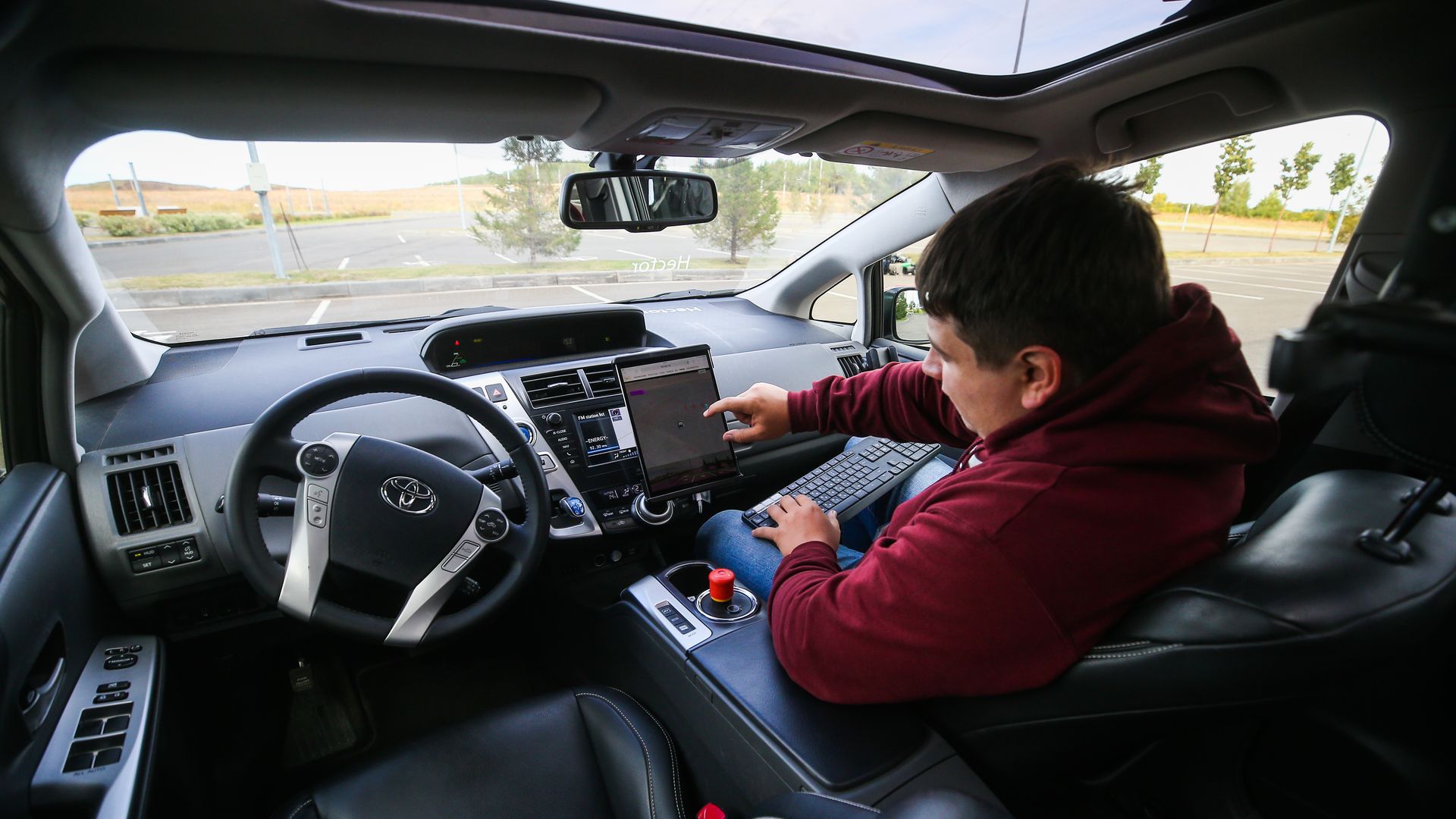 A test engineer in a driverless taxi of Yandex.Taxi ahead of a test-drive in the science city [naukograd] of Innopolis. Yegor Aleyev/TASS (Photo by Yegor Aleyev\TASS via Getty Images)