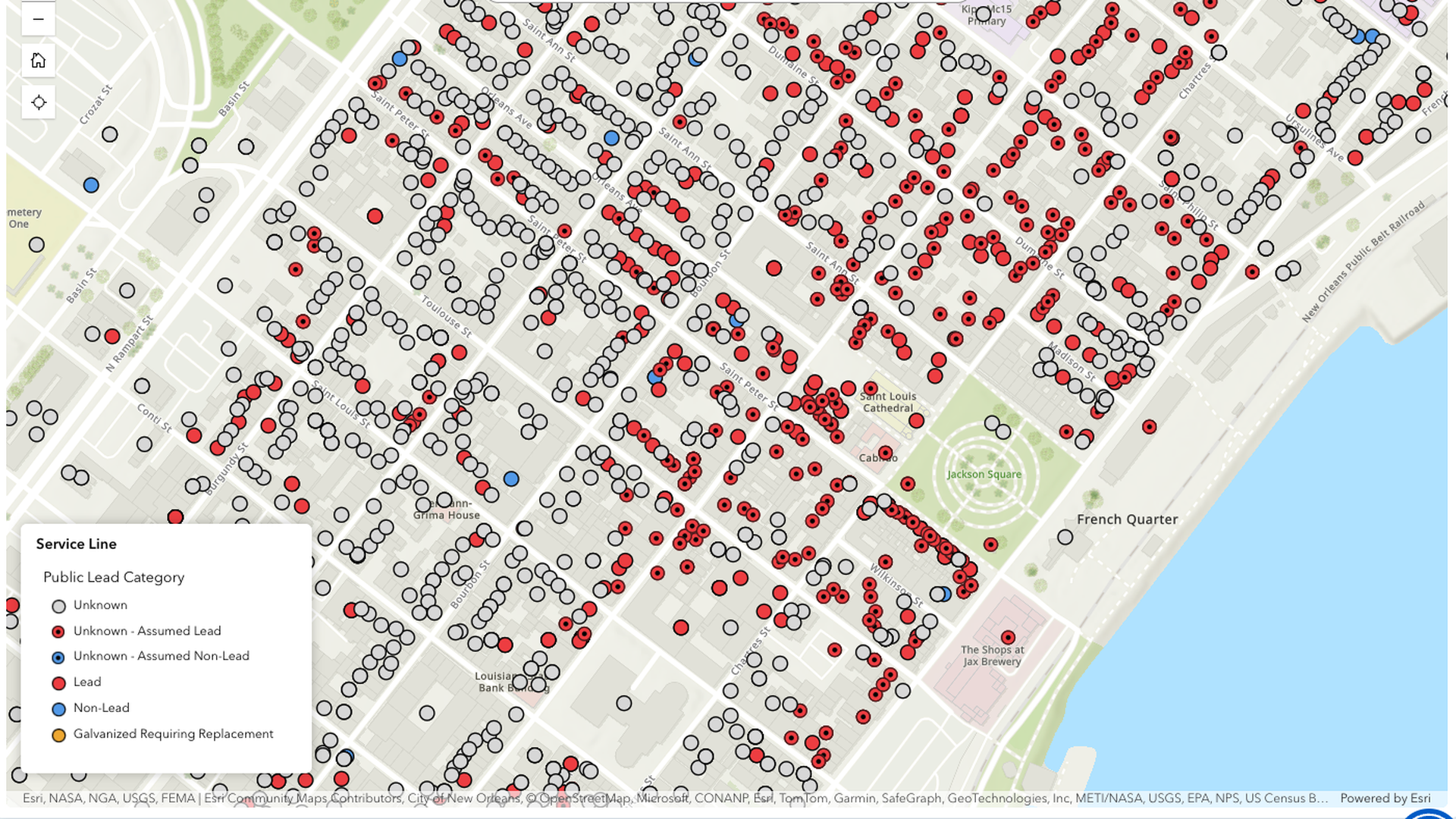 A city map densely marked with many circular red, blue, and black dots along streets near a riverfront park; bottom-left shows a "Service Line" legend explaining lead categories.