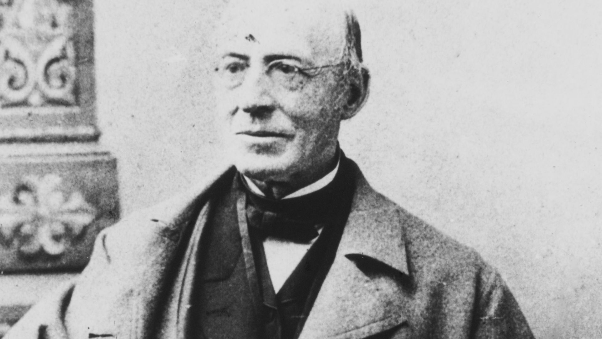 A historic photo in black and white of abolitionist William Lloyd Garrison.