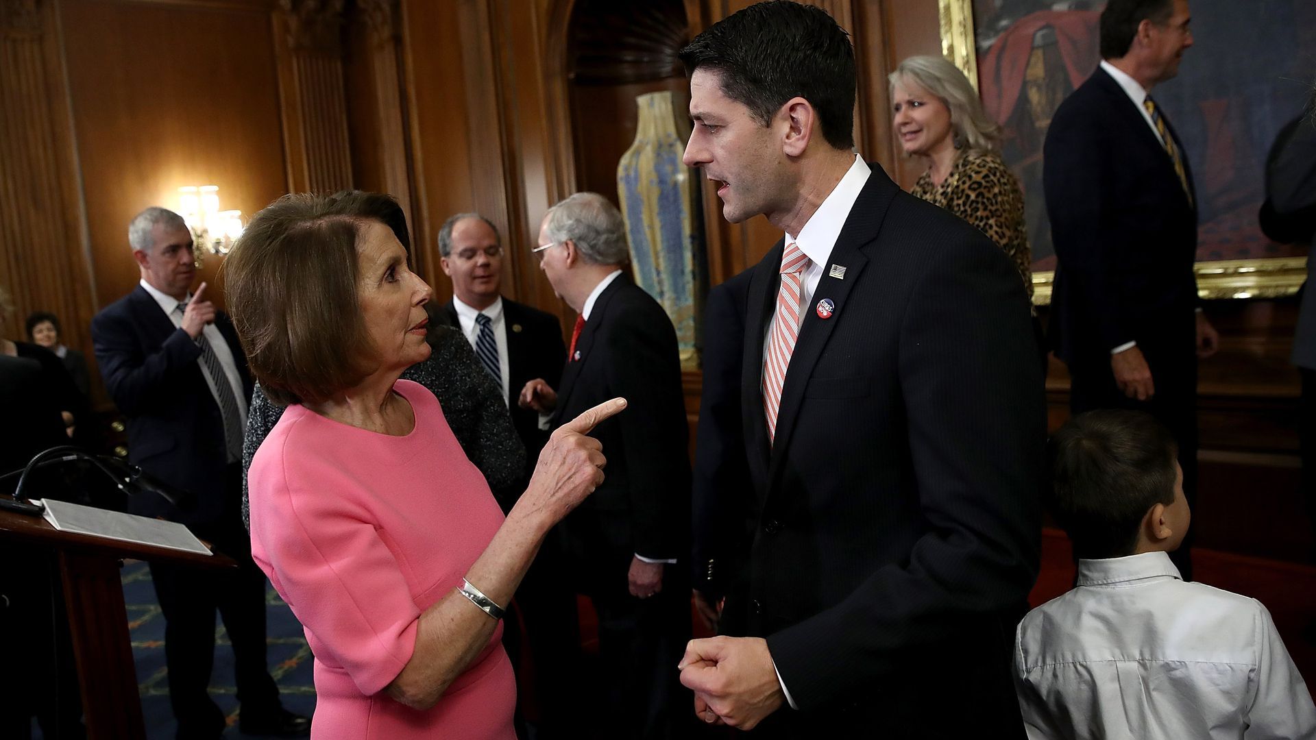 Nancy Pelosi talks to Paul Ryan