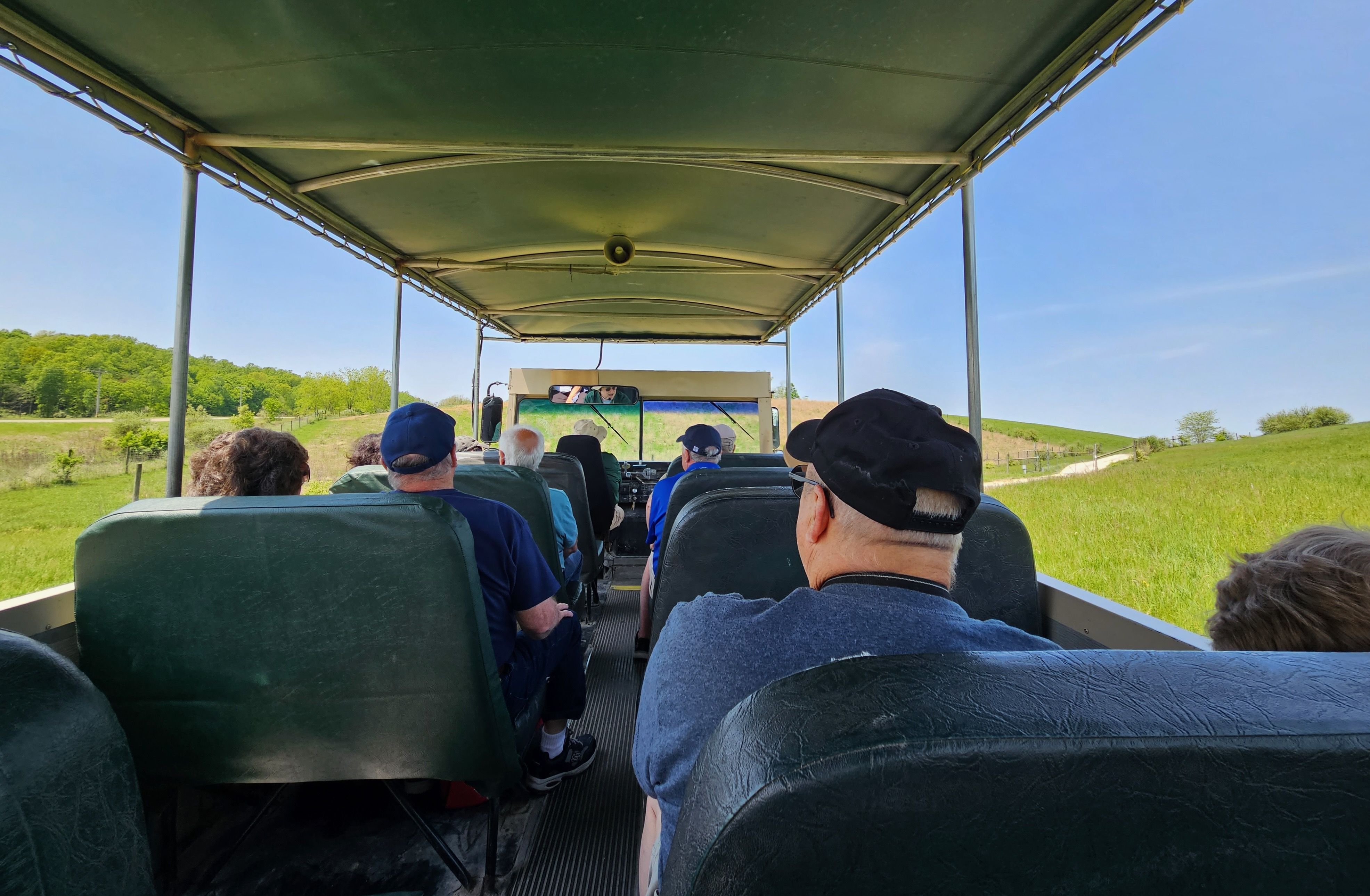 A view from inside an open-air safari tour vehicle