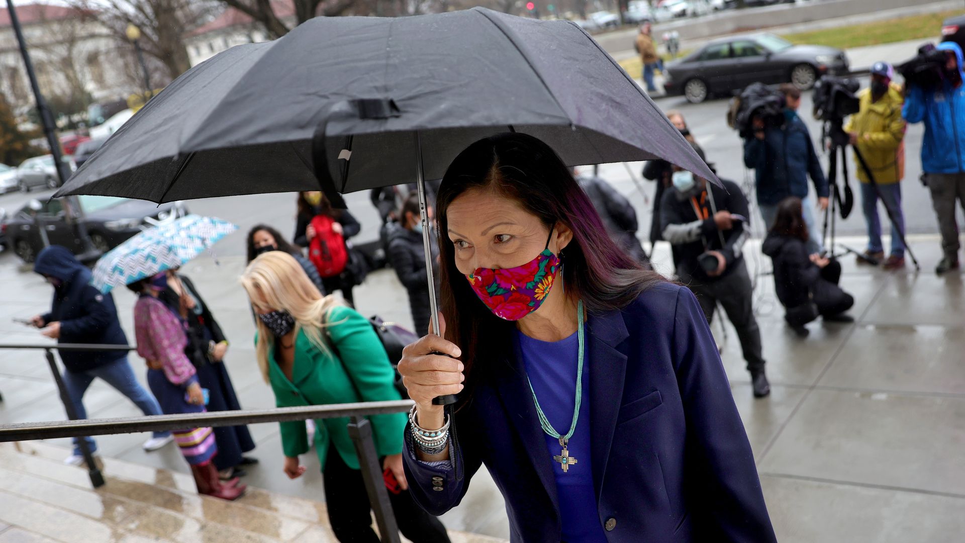 Secretary of the Interior Deb Haaland walking into the Department of Interior in March 2021.