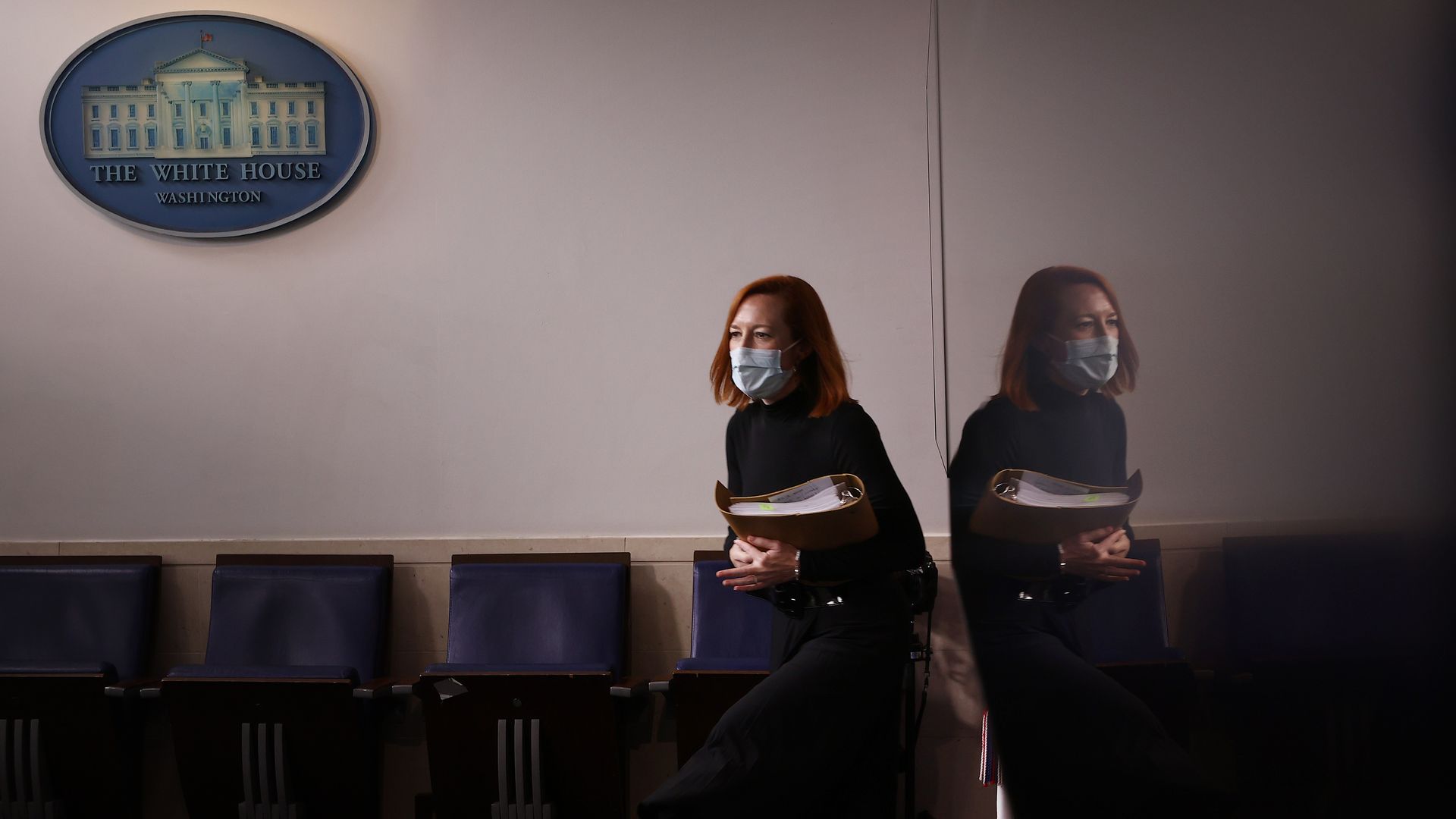 White House Press Secretary Jen Psaki is seen approaching the Briefing Room lectern on Wednesday.