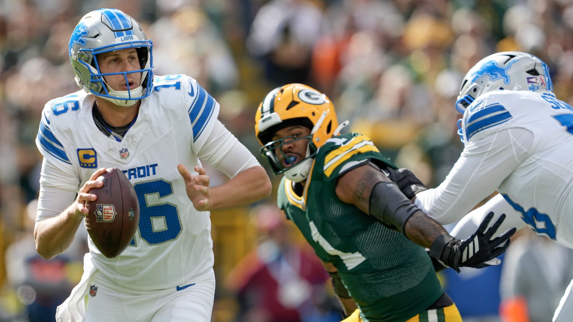 Micah Parsons #1 of the Green Bay Packers pressures Jared Goff #16 of the Detroit Lions during the first quarter in the game at Lambeau Field on September 07, 2025 in Green Bay, Wisconsin.