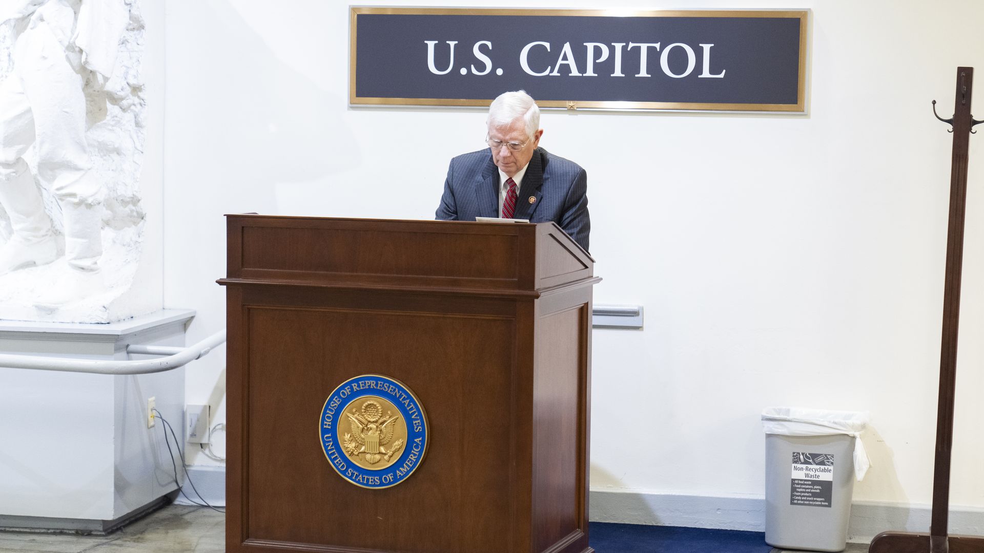 Rep. Mo Brooks, R-Ala., works at a podium in the U.S. Capitols Rayburn subway on Wednesday, March 2, 2022.