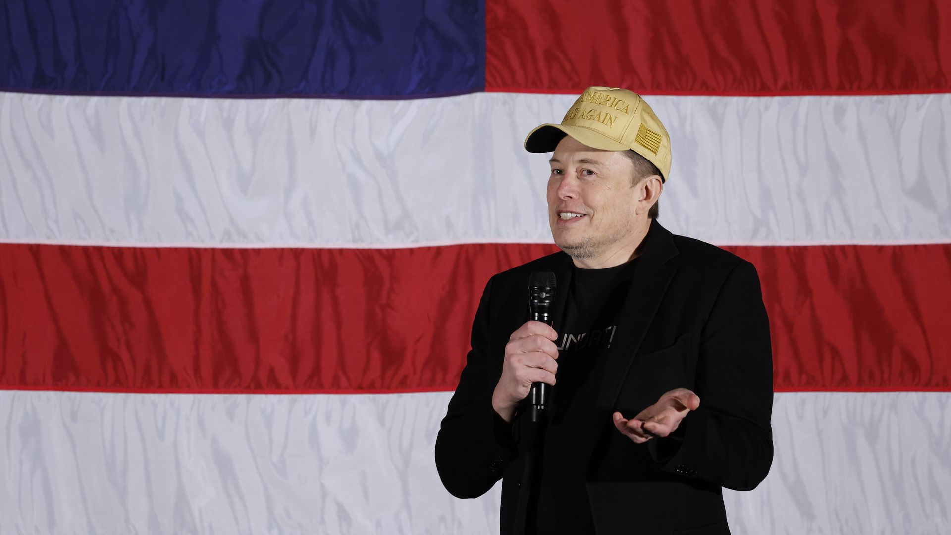 SpaceX and Tesla founder Elon Musk participates in a town hall-style meeting to promote early and absentee voting at Ridley High School on October 17, 2024 in Folsom, Pennsylvania.