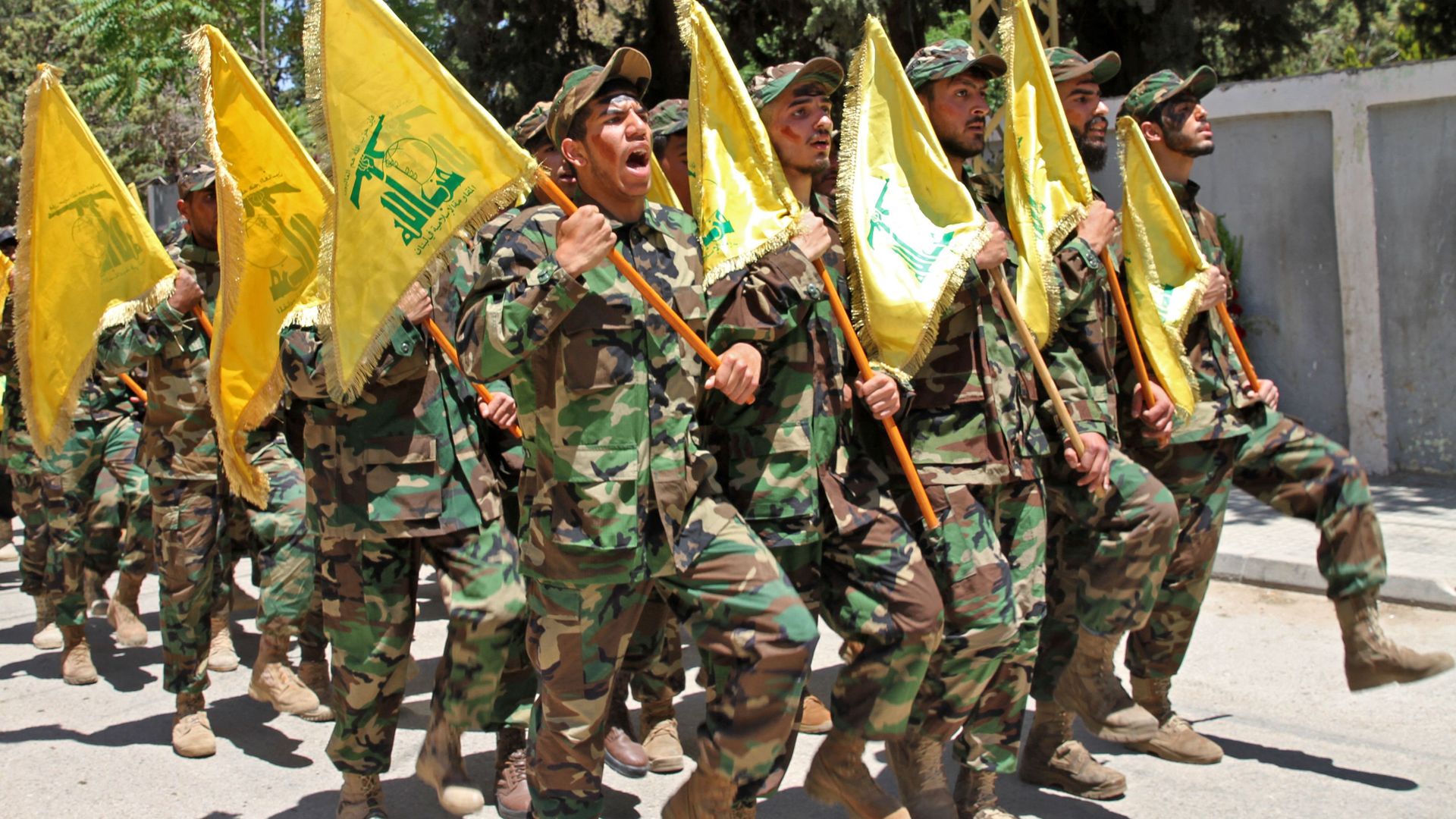 Hezbollah fighters take part in a parade in May. Photo: AFP via Getty Images