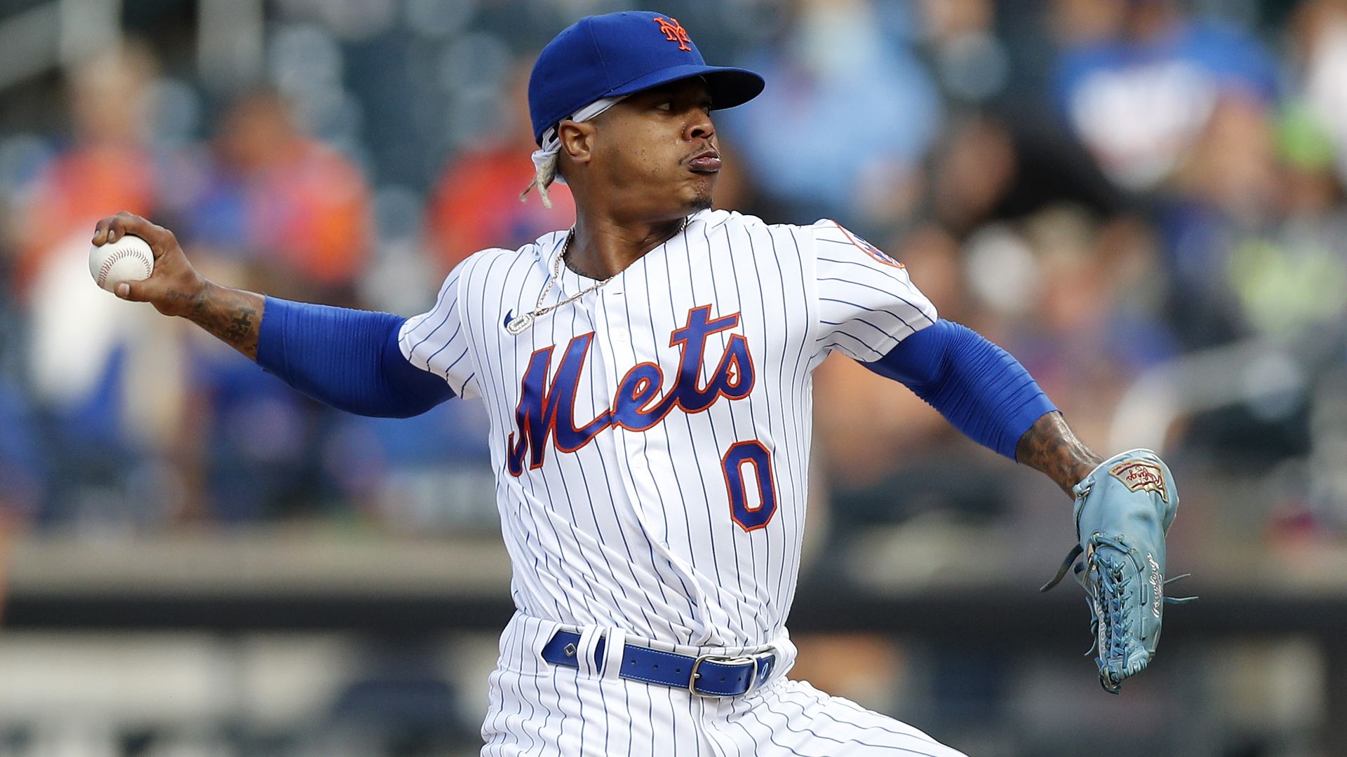 A photo of a player throwing a baseball. 