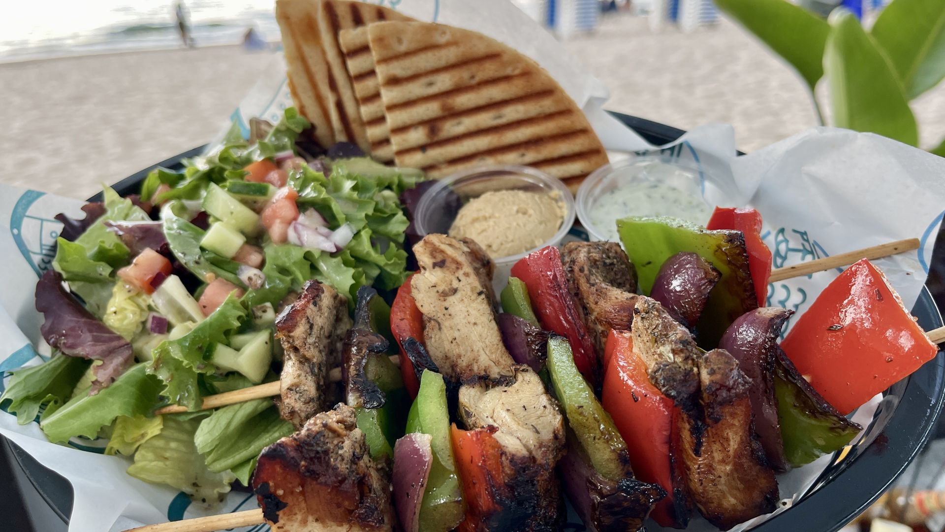 chicken kabobs in a basket