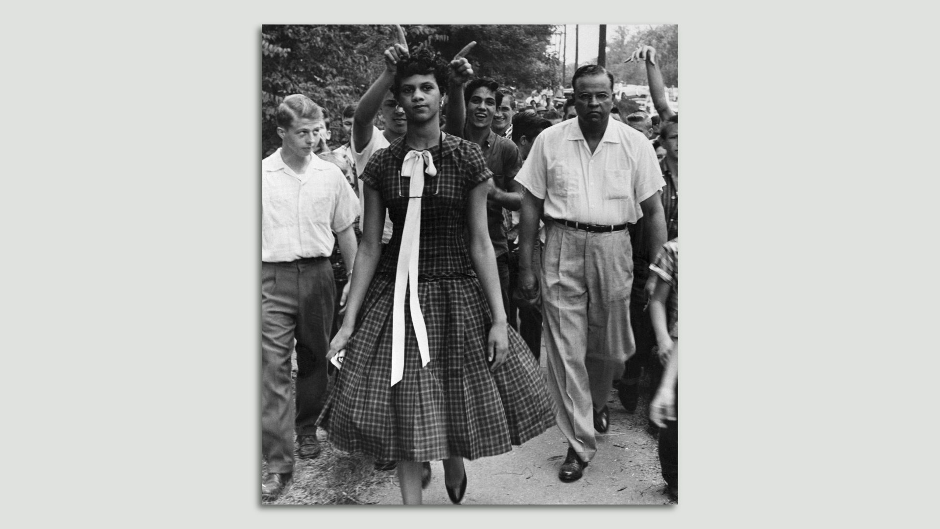 Photo: A crowd of youth taunts Dorothy Geraldine Counts, 15, as she walks to a previously all-white Harding High School to enroll. She was pelted with trash, small sticks and pebbles. Photo: Getty images