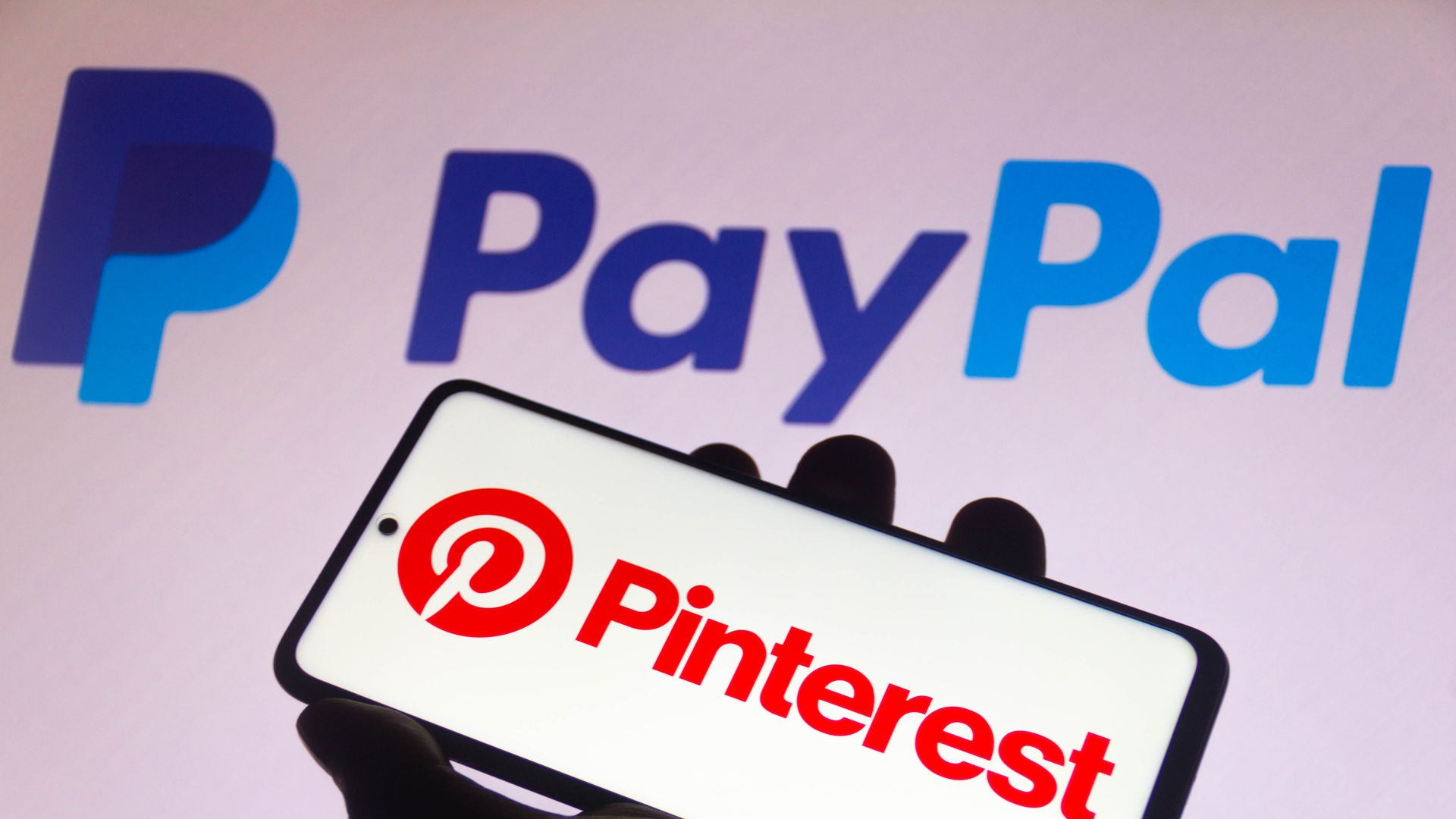 An illustration of PayPal's logo and Pinterest's