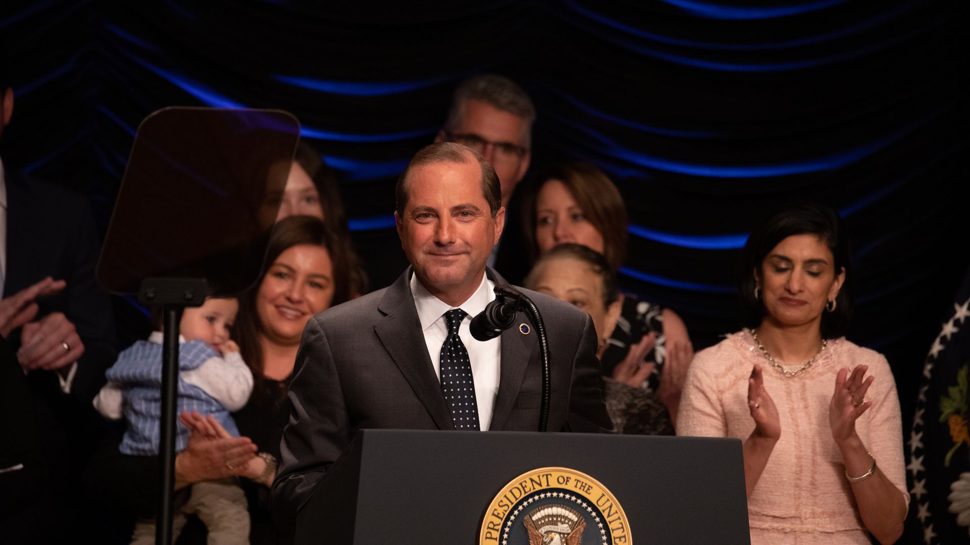 HHS Secretary Alex Azar speaks at an event in July as CMS Administrator Seema Verma stands in the background.