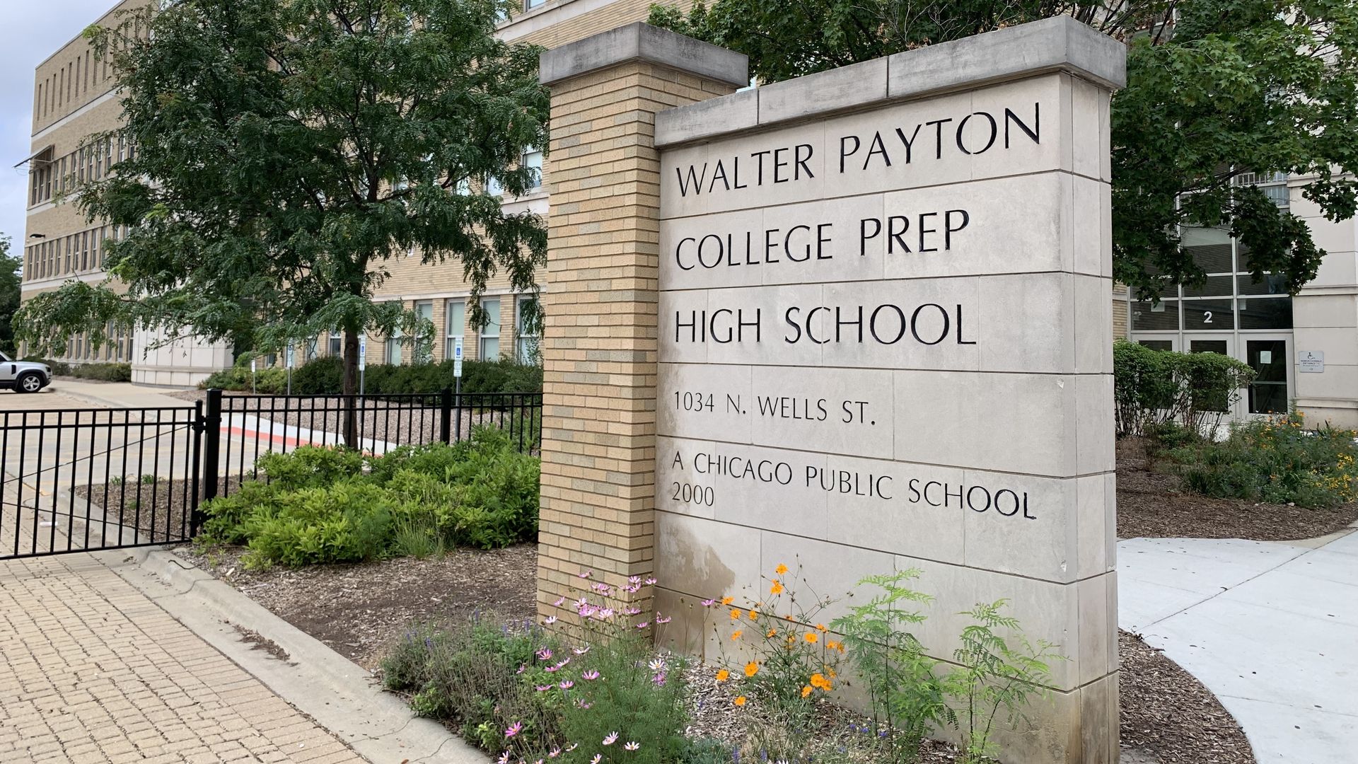 Sign in front of a high school building 
