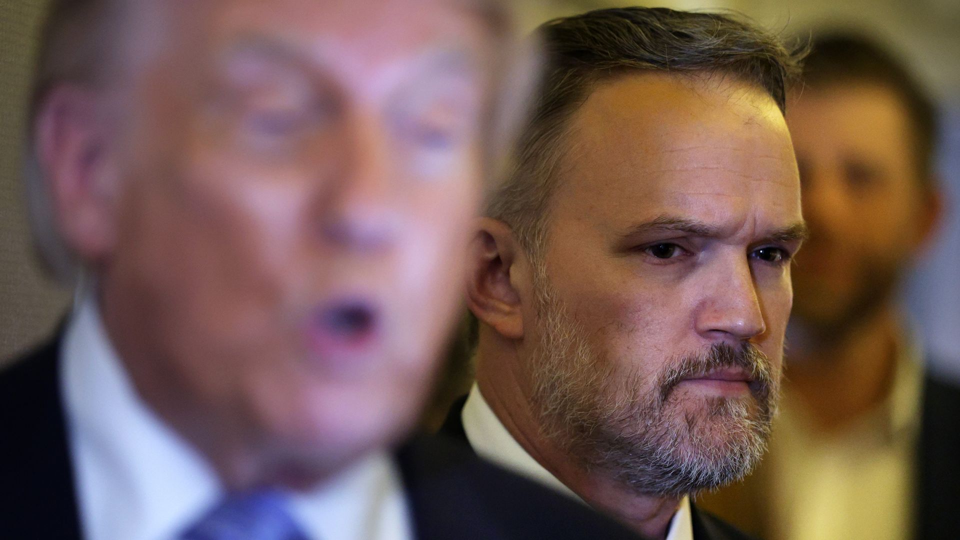 U.S. Trade Representative Jamieson Greer as Trump briefs reporters on Air Force One.