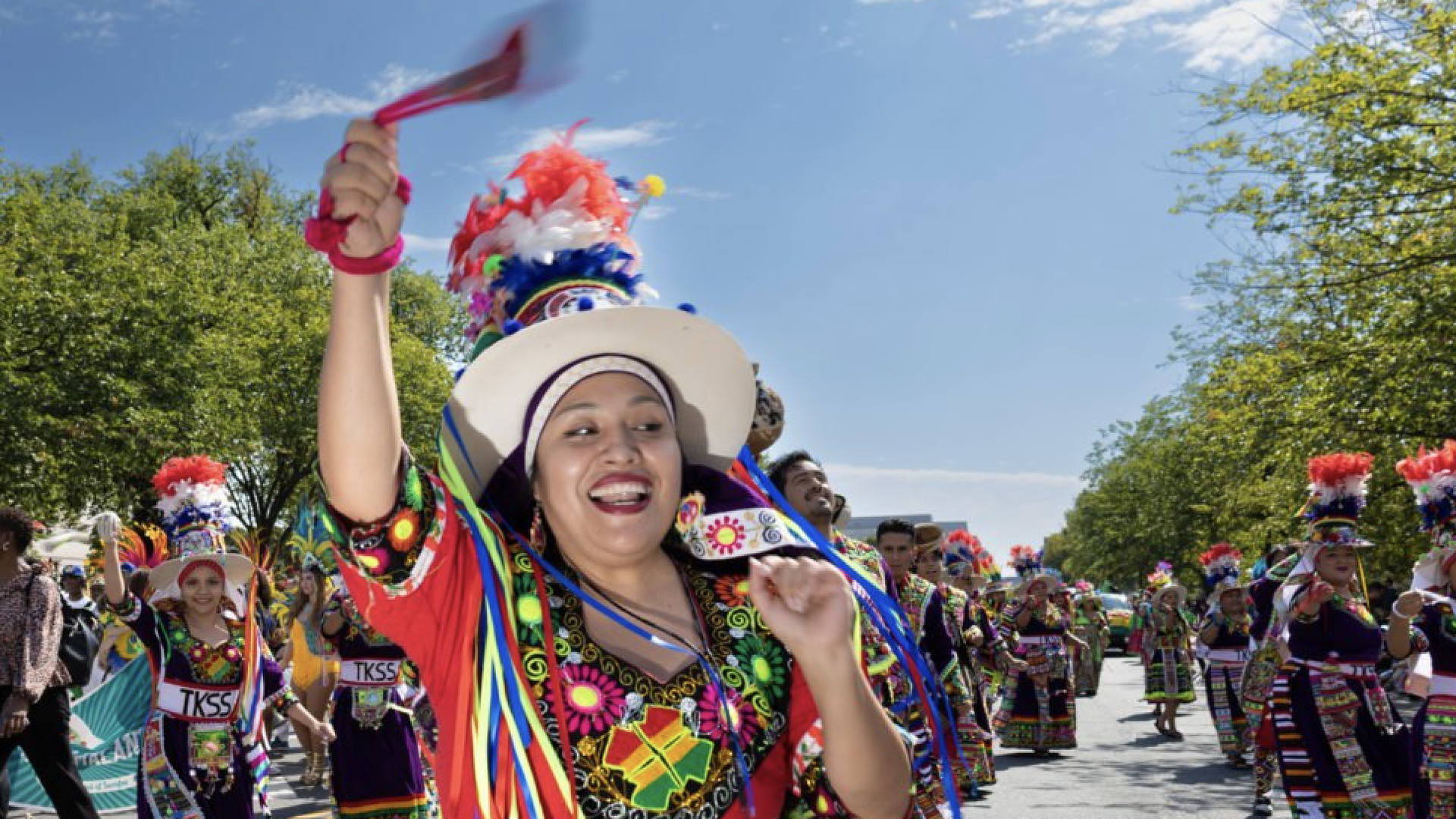 A woman participating in the Fiesta DC parade. 