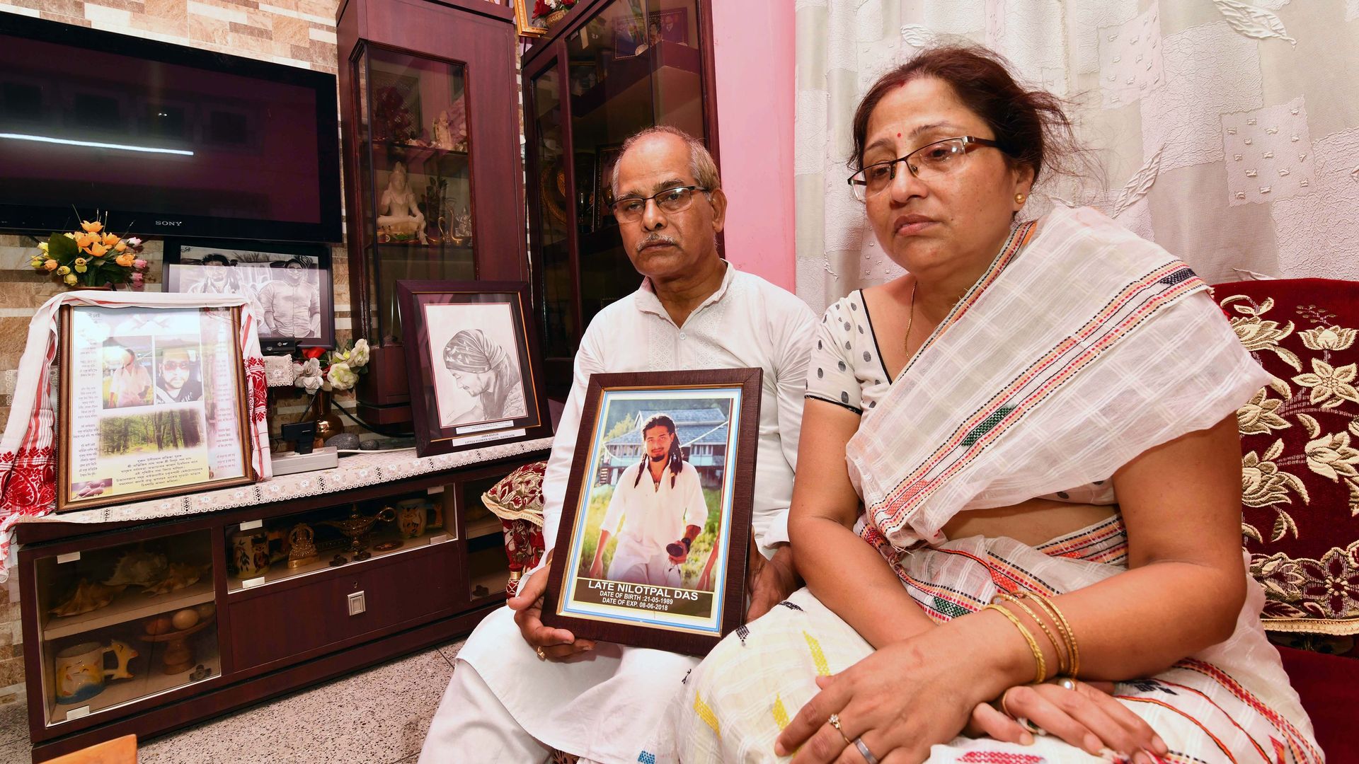 The parents of victim beaten to death by a mob sparked by rumours spread on Facebook and WhatsApp in India about child abductors. Photo credit should read Biju Boro/AFP/Getty Images