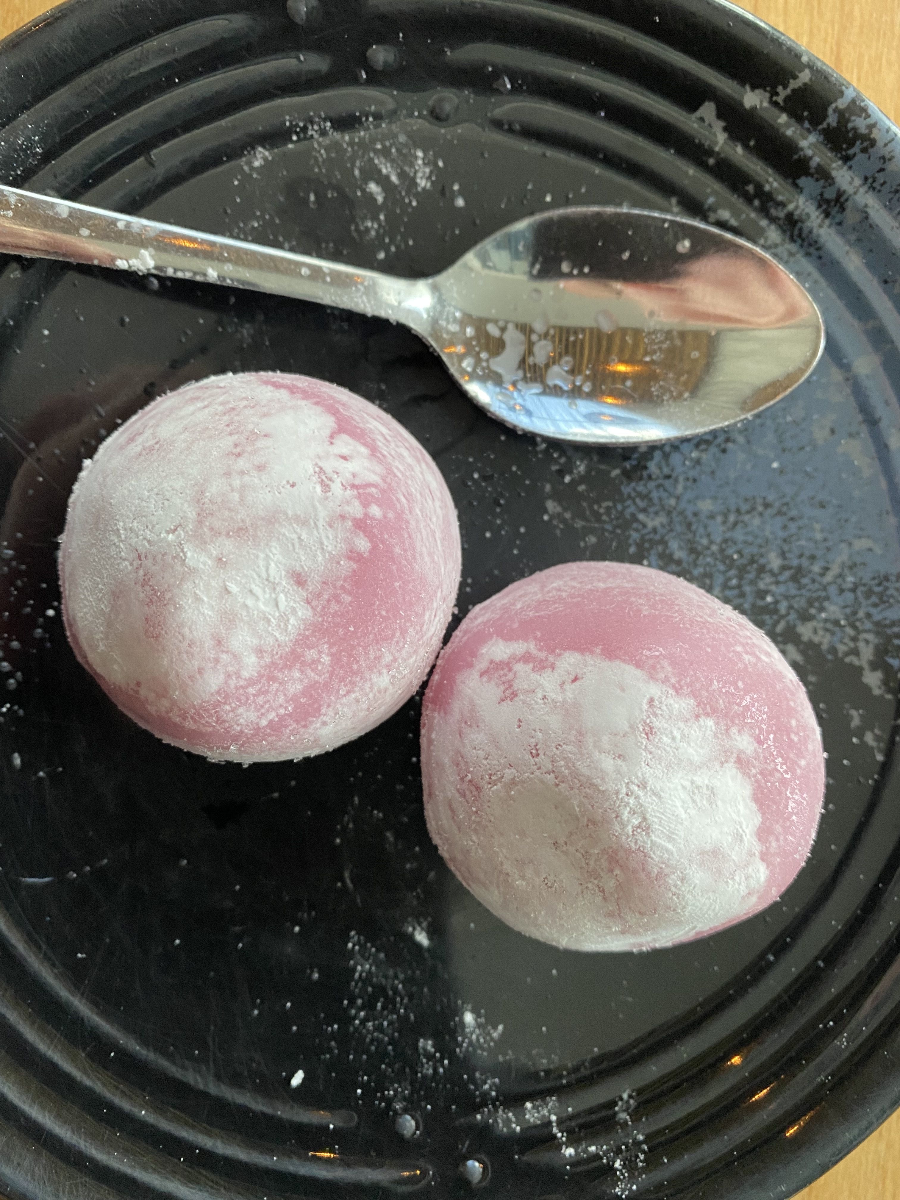 A plate of mochi ice cream balls. 