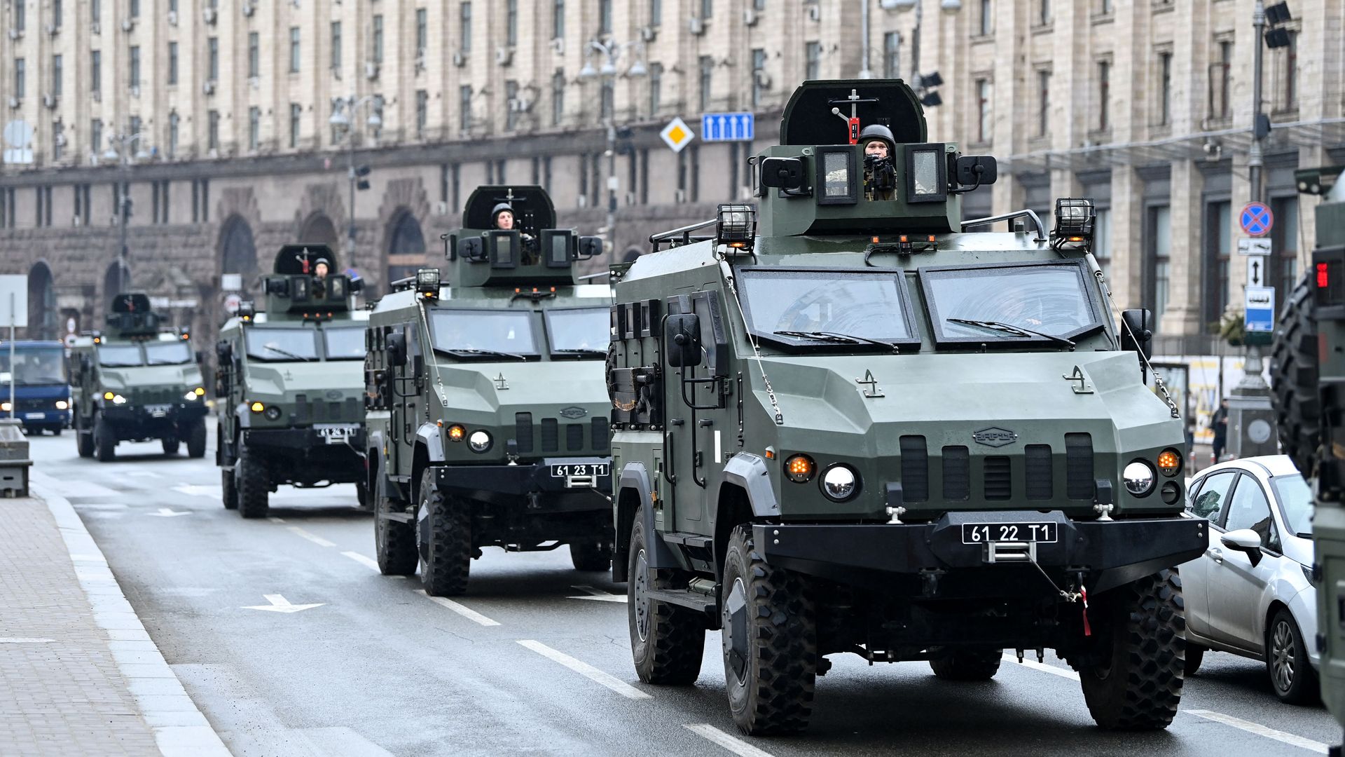 Armored vehicles from the Ukrainian armed forces drive through Kyiv on Feb. 24, 2021.