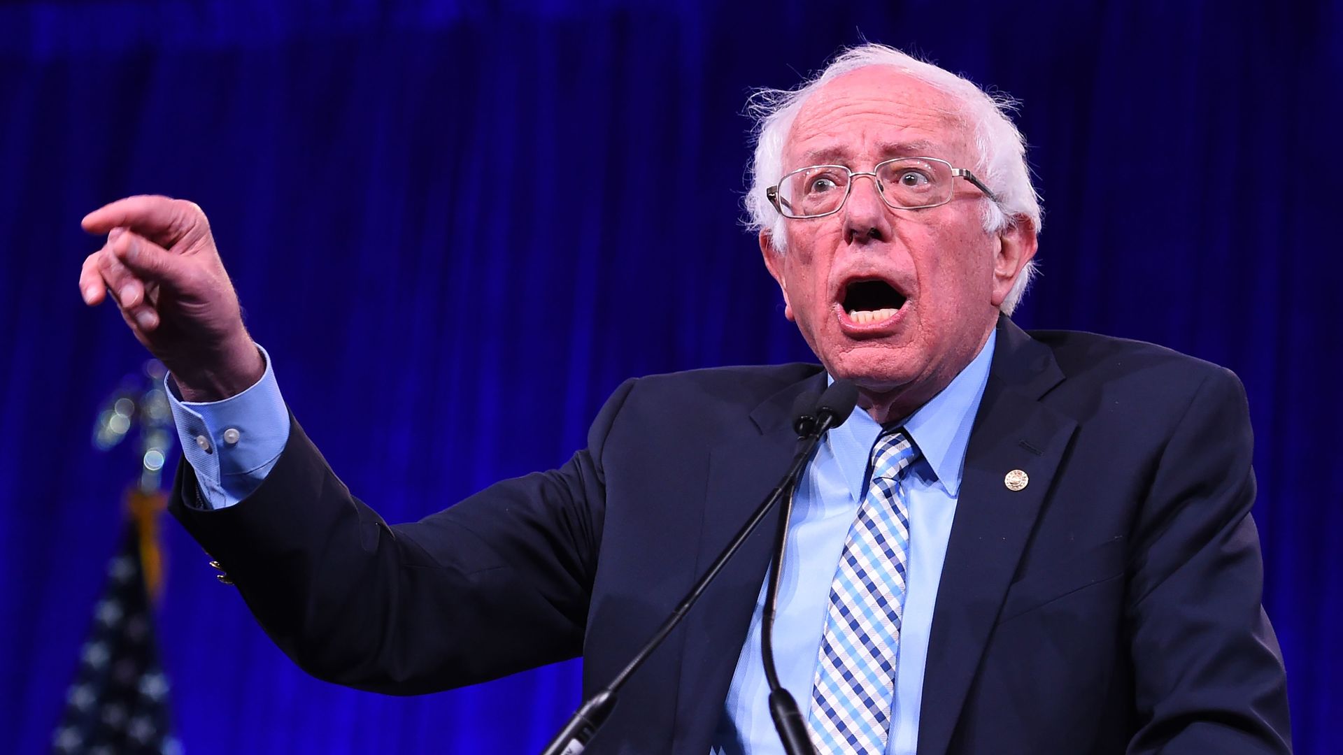 Democratic Presidential hopeful US Senator for Vermont Bernie Sanders speaks on-stage during the Democratic National Committee's summer meeting in San Francisco, California on August 23