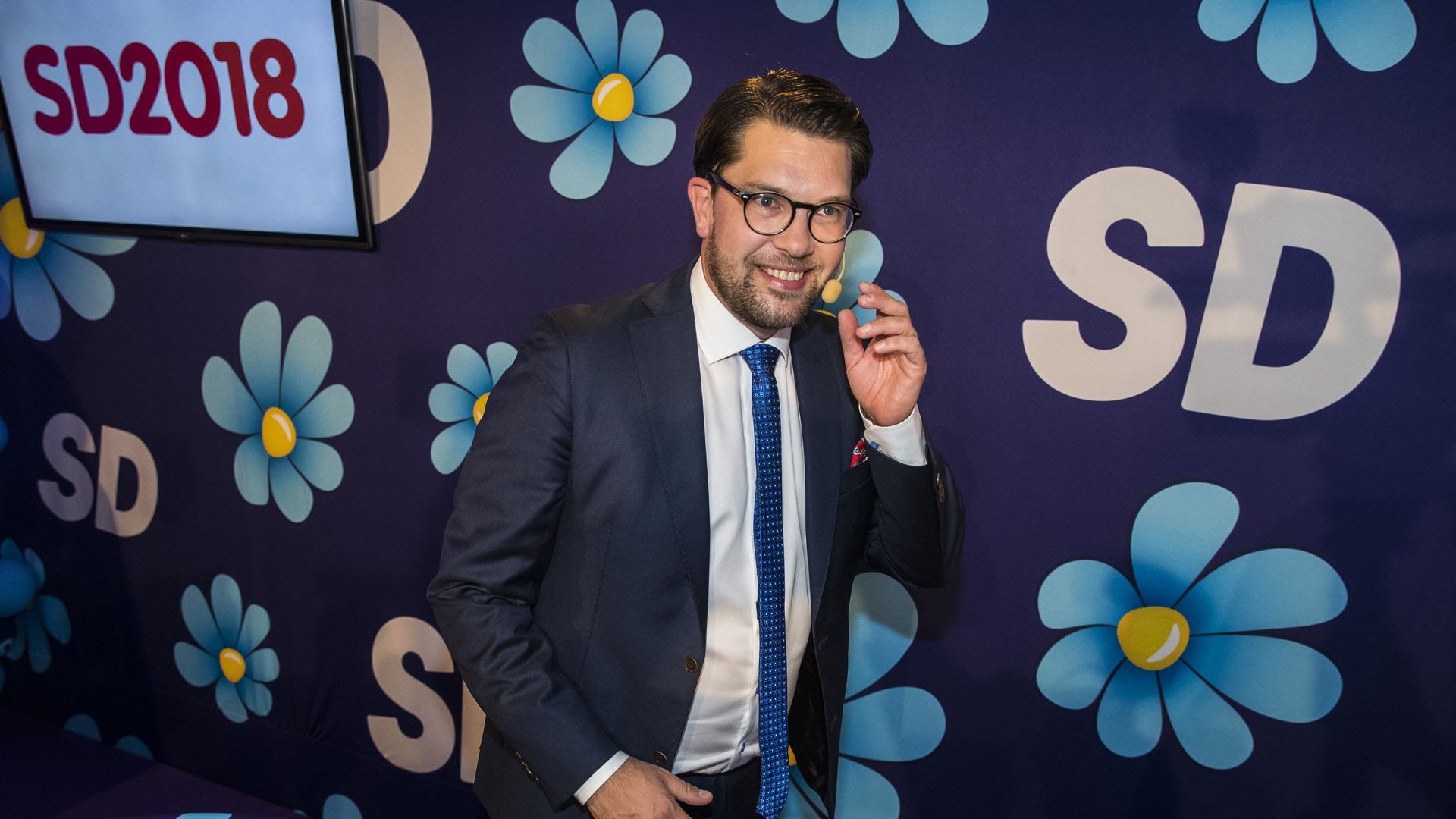 Jimmy Akesson smiles at a press event