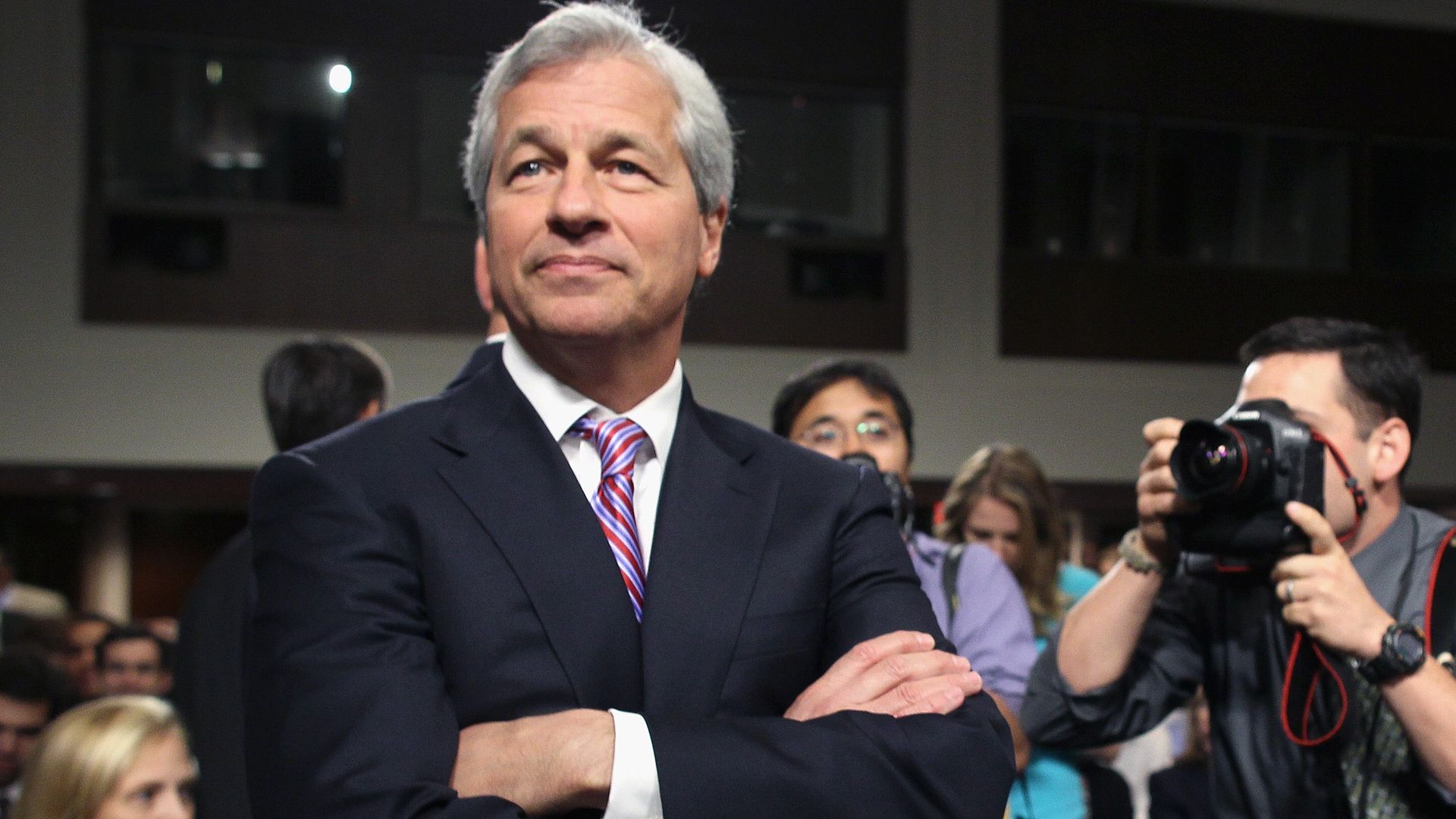 JP Morgan CEO Jamie Dimon poses with his arms folded.