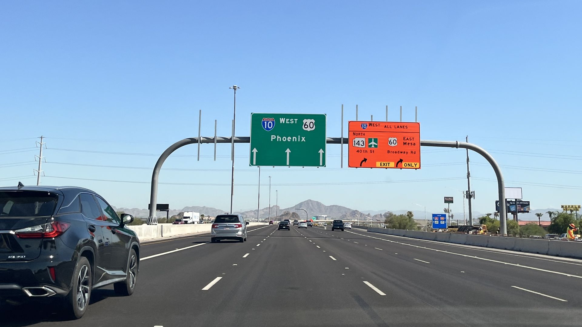Signs showing freeway exits.