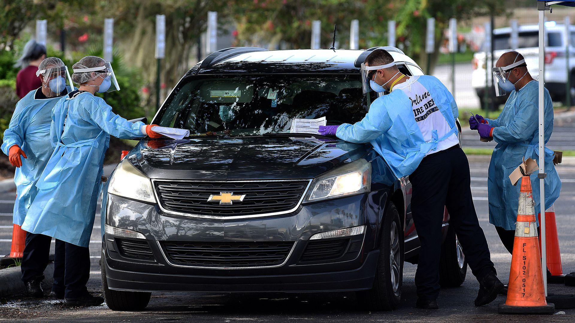 A car in a coronavirus drive thru test