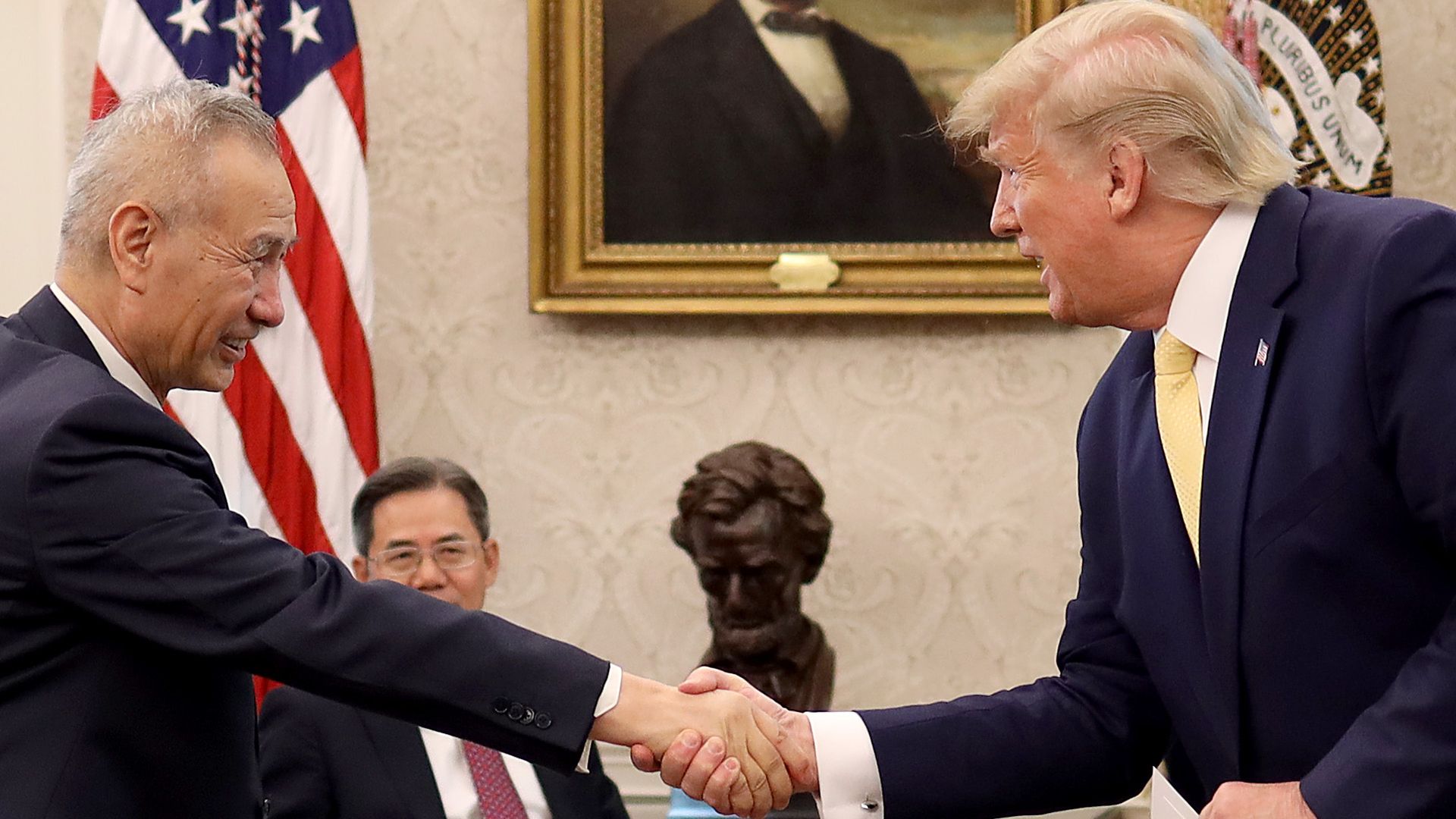 President Trump shakes hands with Chinese Vice Premier Liu He.
