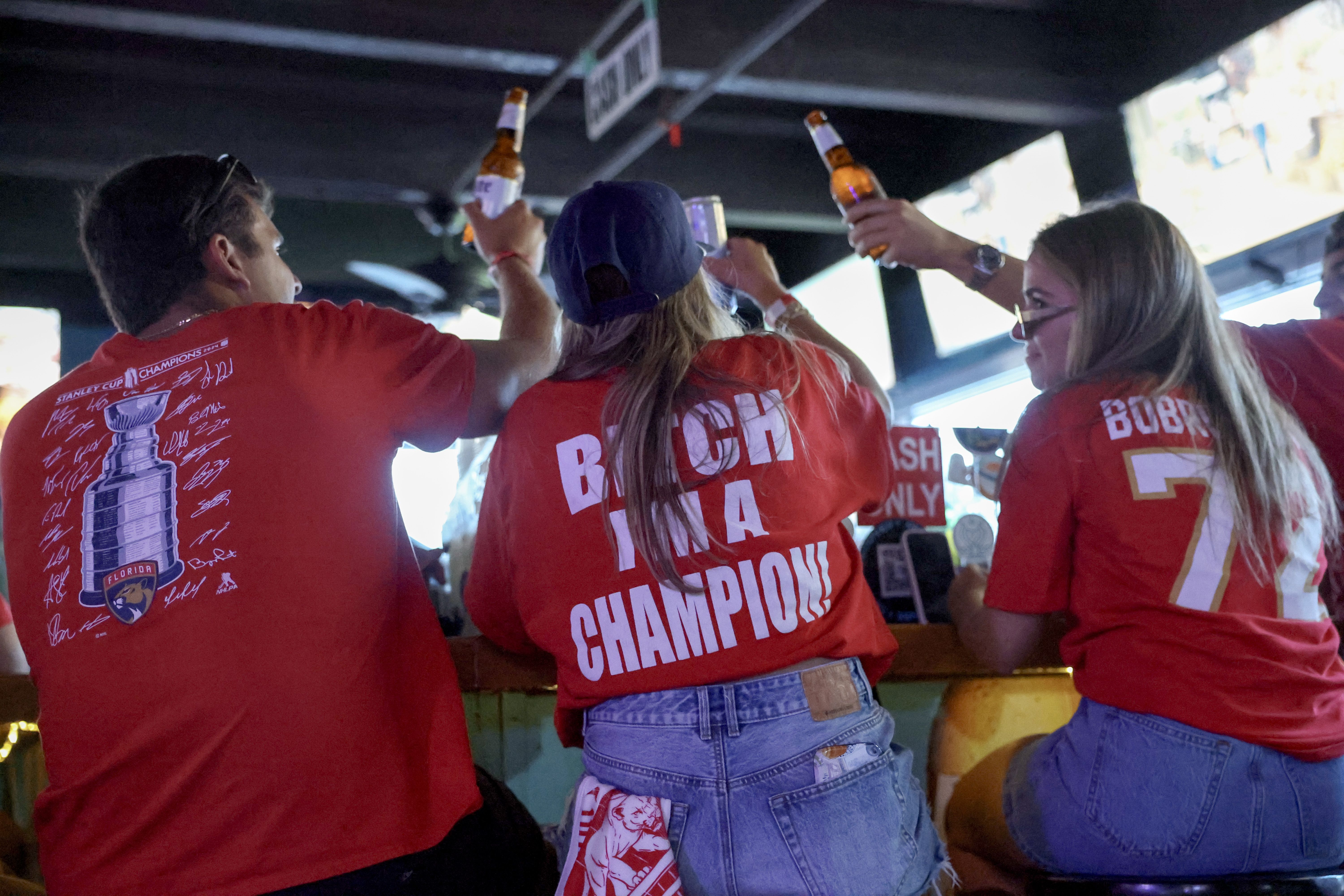 FORT LAUDERDALE, FLORIDA - JUNE 17: Fans prepare to watch the Florida Panthers and Edmonton Oilers play in Game Six of the 2025 Stanley Cup Final on a television at the Elbo Room on June 17, 2025 in Fort Lauderdale, Florida. The Panthers would become the third team in the 21st century to repeat as S